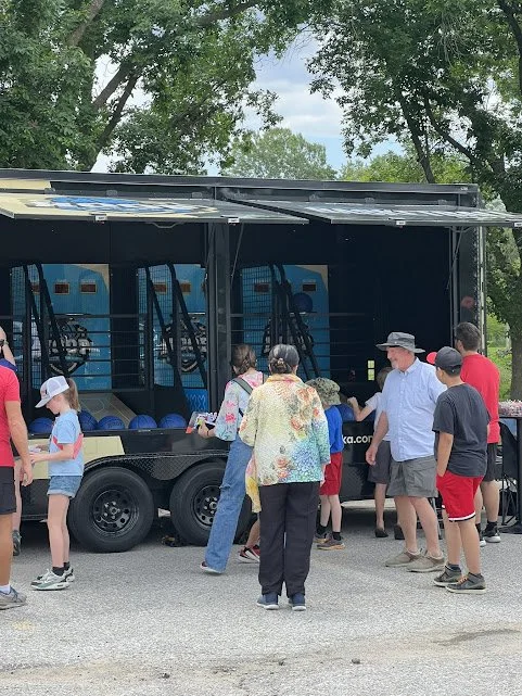 Hoop Nebraska: Make Your May Events Unforgettable with a Mobile Arcade Basketball Trailer