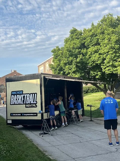 Hoop Nebraska: Make Your June Events Unforgettable with a Mobile Arcade Basketball Trailer
