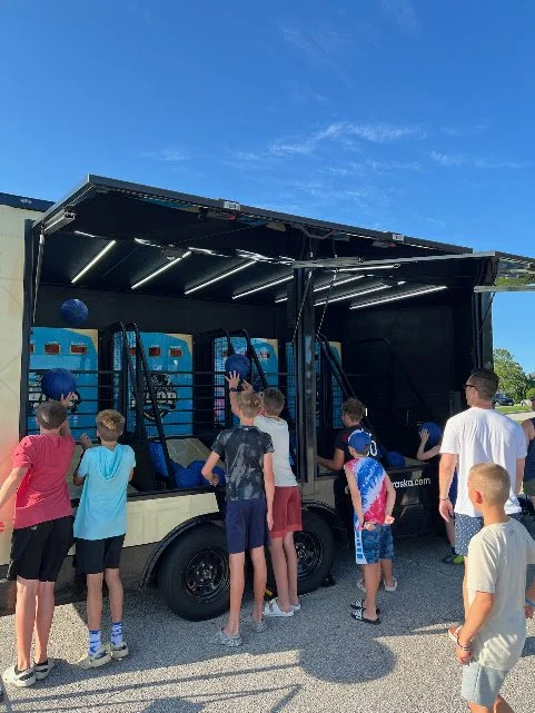 Hoop Nebraska: Make Your Mid-June Events Unforgettable with a Mobile Arcade Basketball Trailer