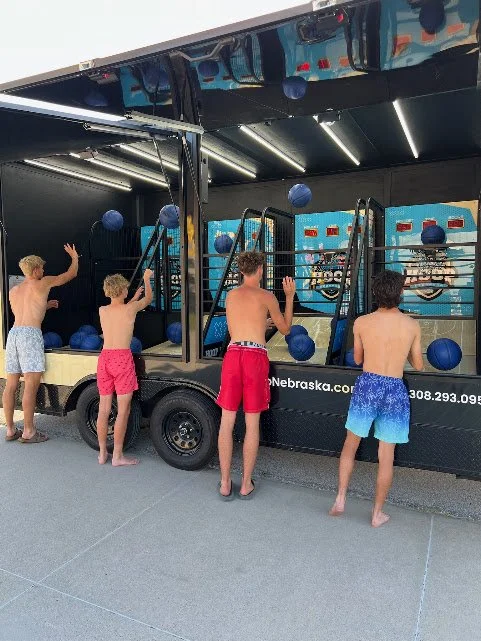Hoop Nebraska: Make Your Late-June Events Unforgettable with a Mobile Arcade Basketball Trailer