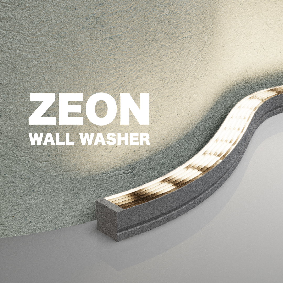 Close-up of a wall with a Geon wall washer light fixture casting light on textured wall surface.