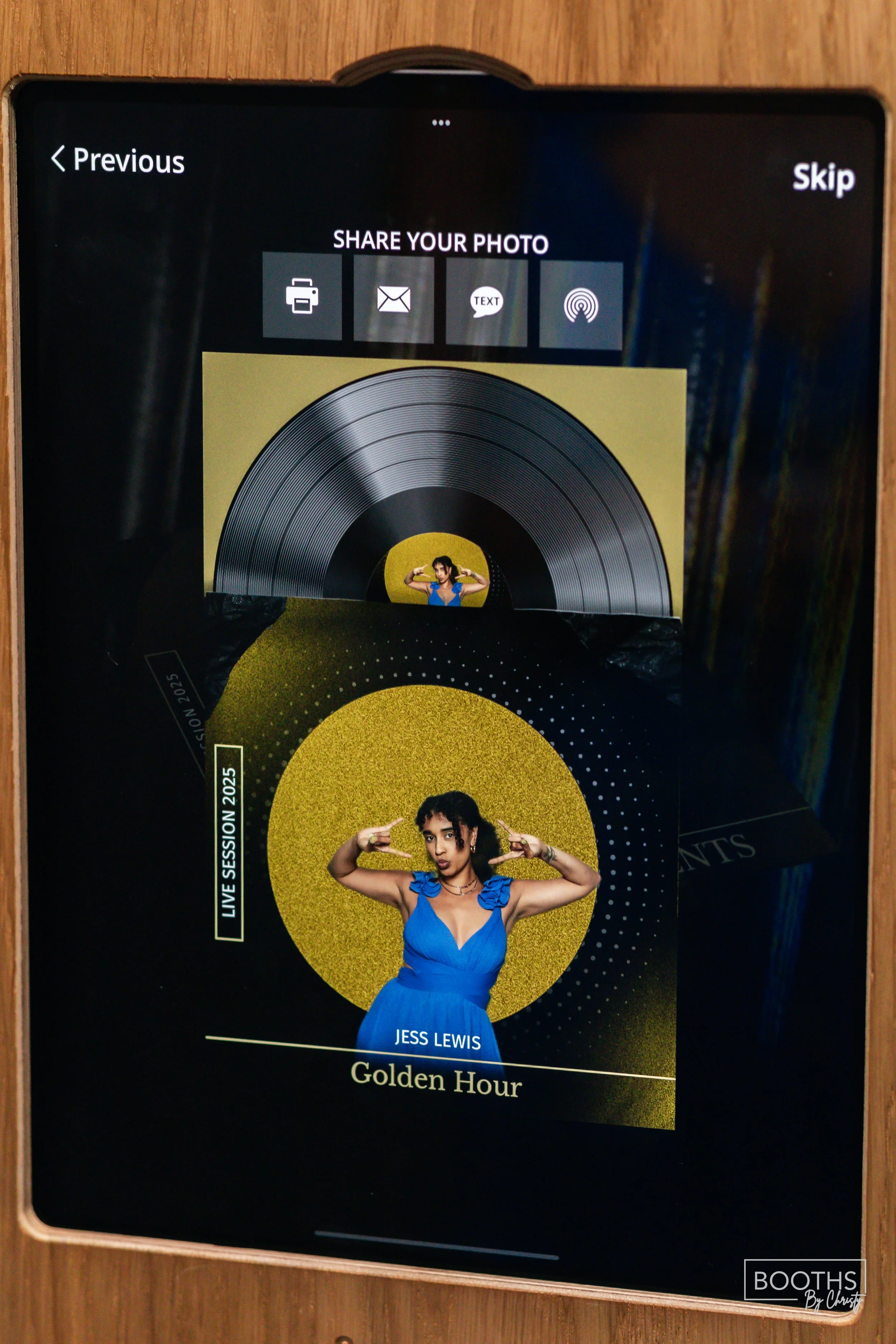 Mobile phone screen showing sharing options and a promotional image of Jess Lewis for the event 'Golden Hour,' with a woman wearing a blue dress posing with her hands near her head in front of a yellow circular background.