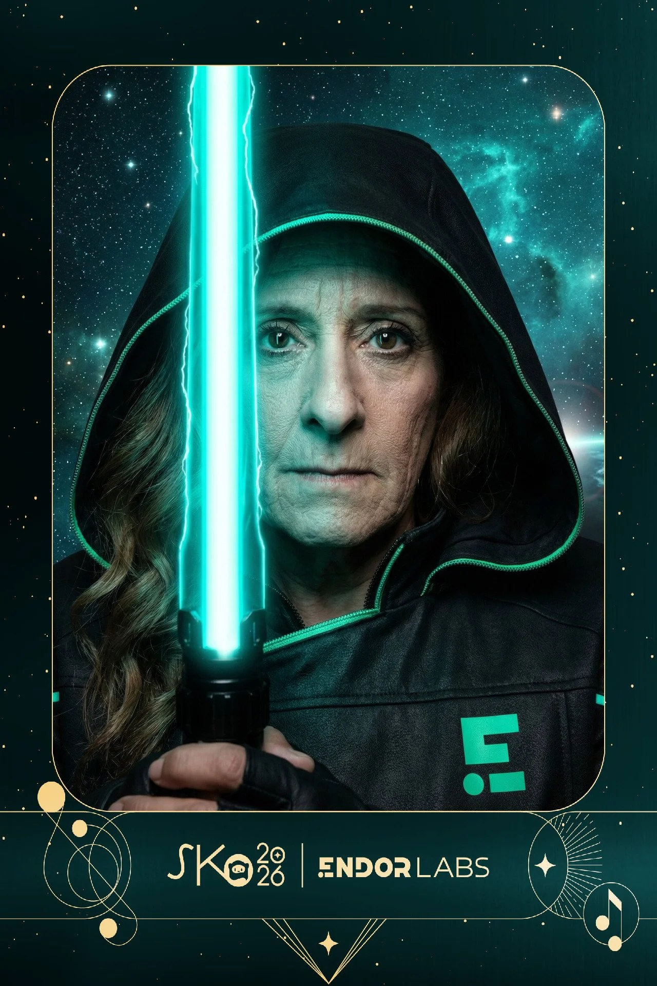 A woman with long brown hair, wearing a black hoodie with teal accents, holds a blue lightsaber vertically in front of her face. The background features a starry sky with nebula clouds and cosmic elements, with a dark border and gold decorative accen