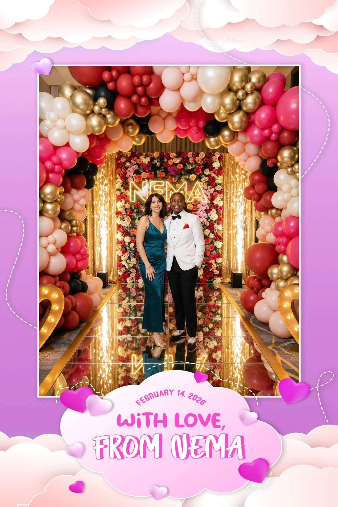 A couple dressed in formal attire standing in front of a flower-covered backdrop with neon sign that says "NEMA." The backdrop is surrounded by an arch of pink, red, black, white, and gold balloons. The photo has a decorative purple border with heart