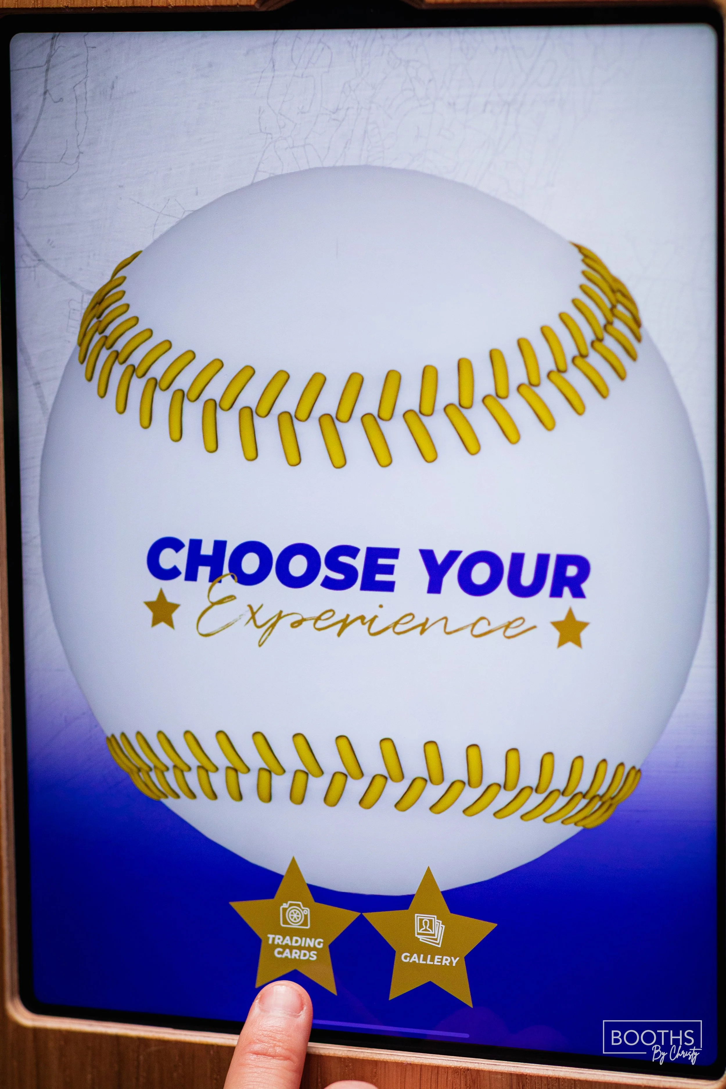 Interactive display with a baseball-themed design featuring the message "Choose Your Experience" and options for trading cards and a gallery.