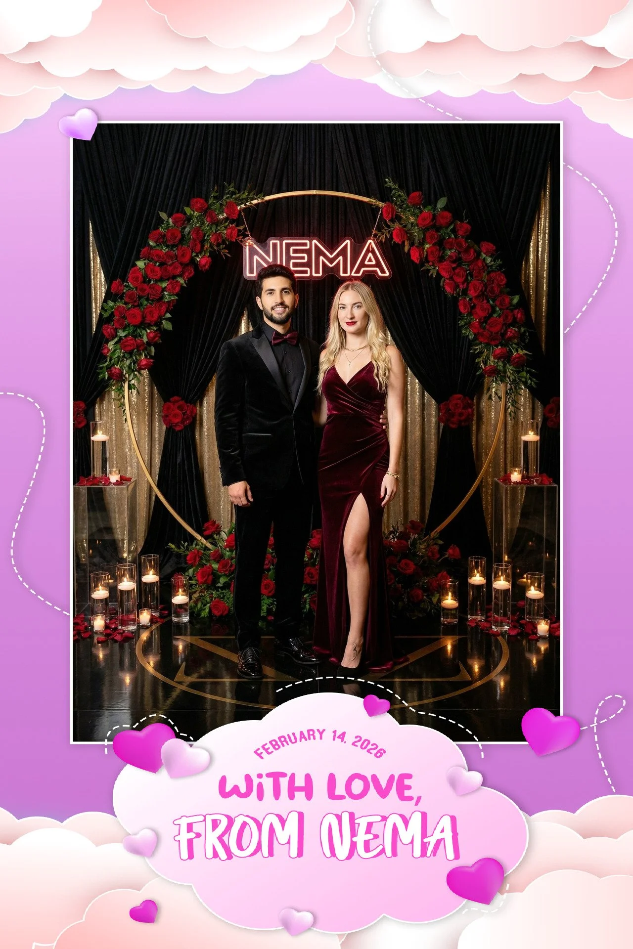 A couple dressed in formal attire standing in front of a black and gold curtain with a heart-shaped floral arch and a neon sign that says 'NEMA'. The woman is wearing a burgundy velvet gown with a thigh-high slit, and the man is in a black tuxedo wit