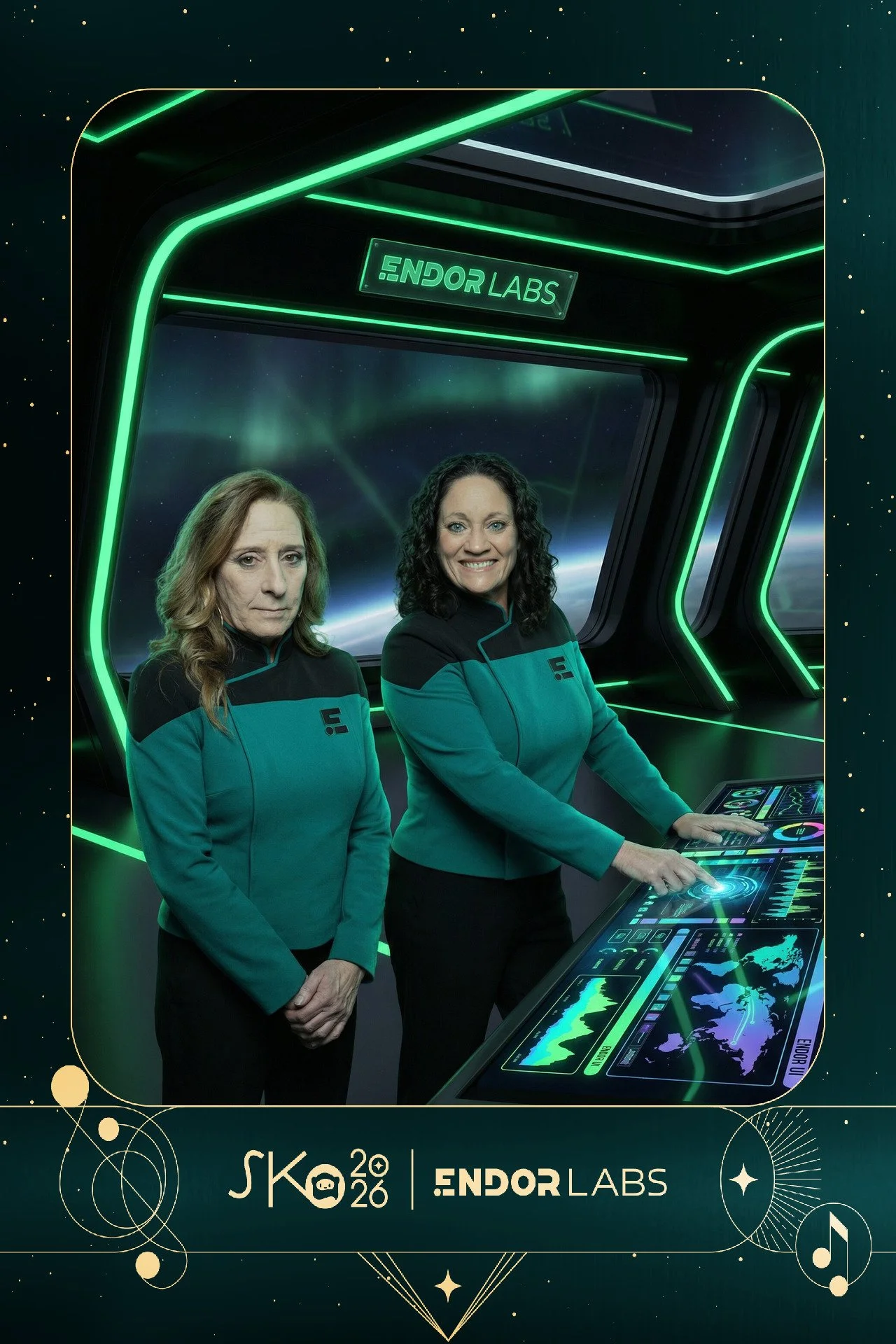 Two women in teal and black uniforms inside a futuristic spaceship control room with digital panels and a view of space and the Northern Lights outside the window.