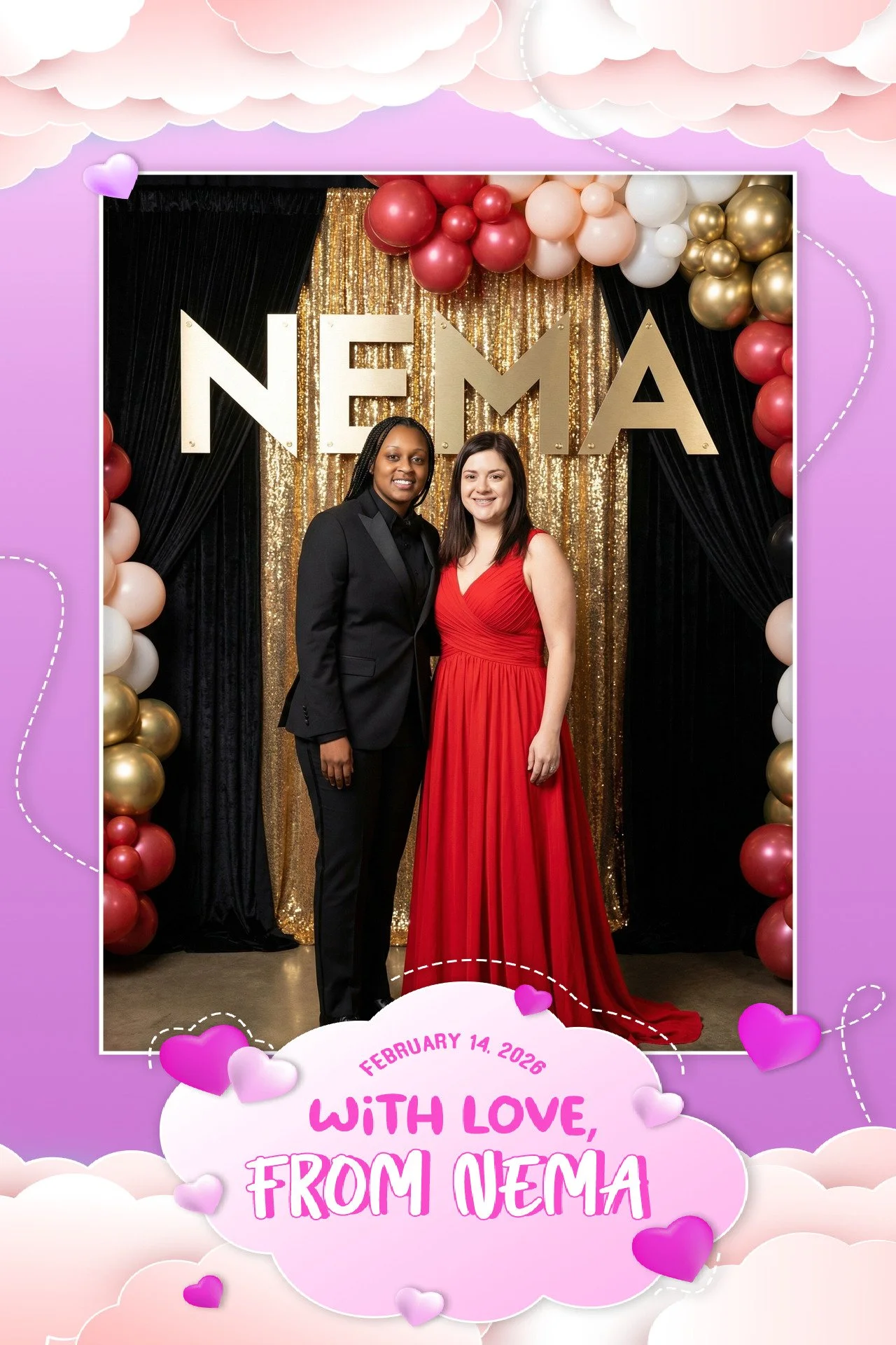 Two women dressed formally, one in a black suit and the other in a red dress, standing in front of a backdrop with gold, black, white, and red balloons and a sign that reads 'NEMA'. The image is bordered with pink and purple clouds and hearts with th