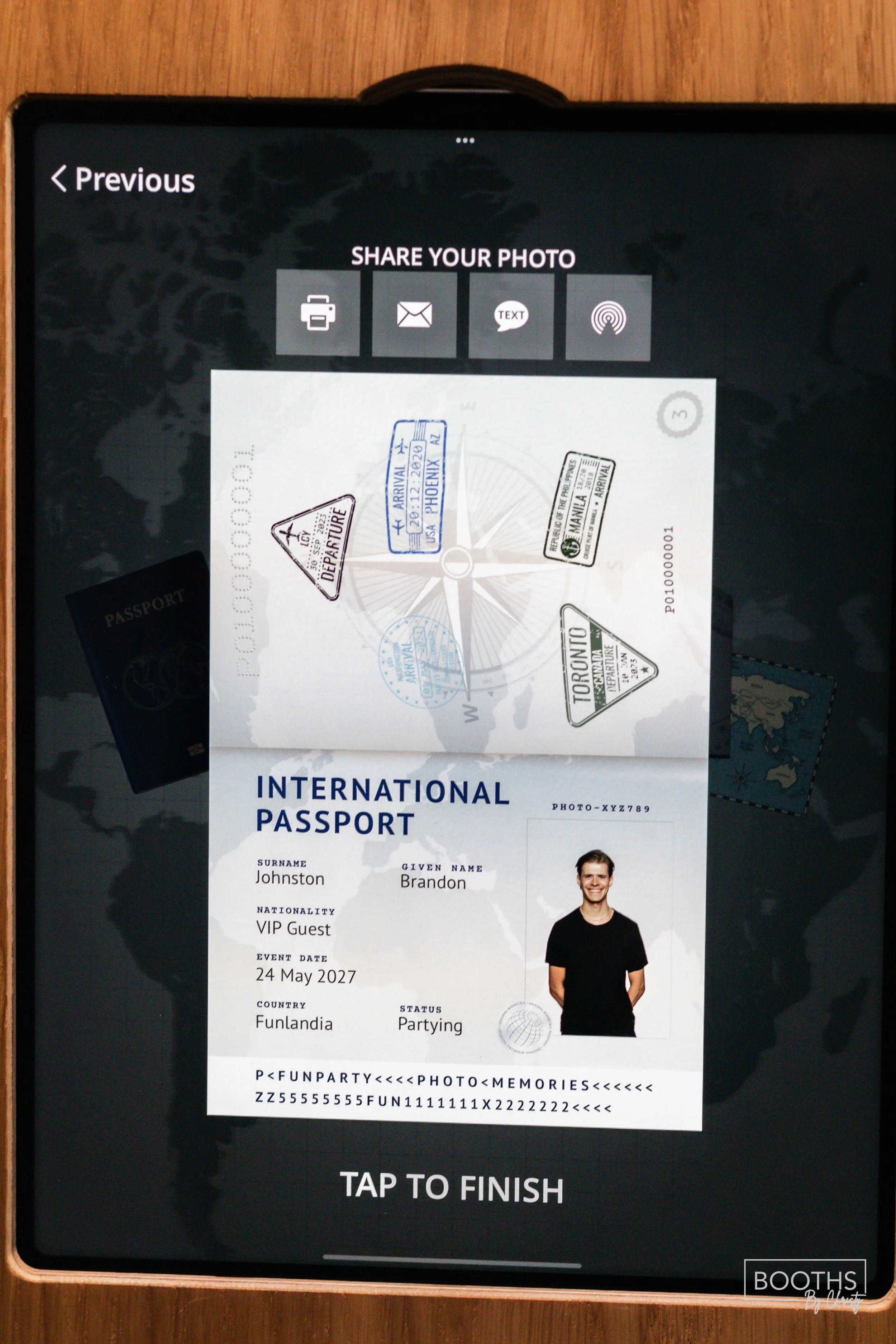 Digital display of a fictional international passport for Brandon Johnston, VIP Guest, traveling from Funlandia on May 24, 2027, with photos and travel stamps, on a tablet screen.