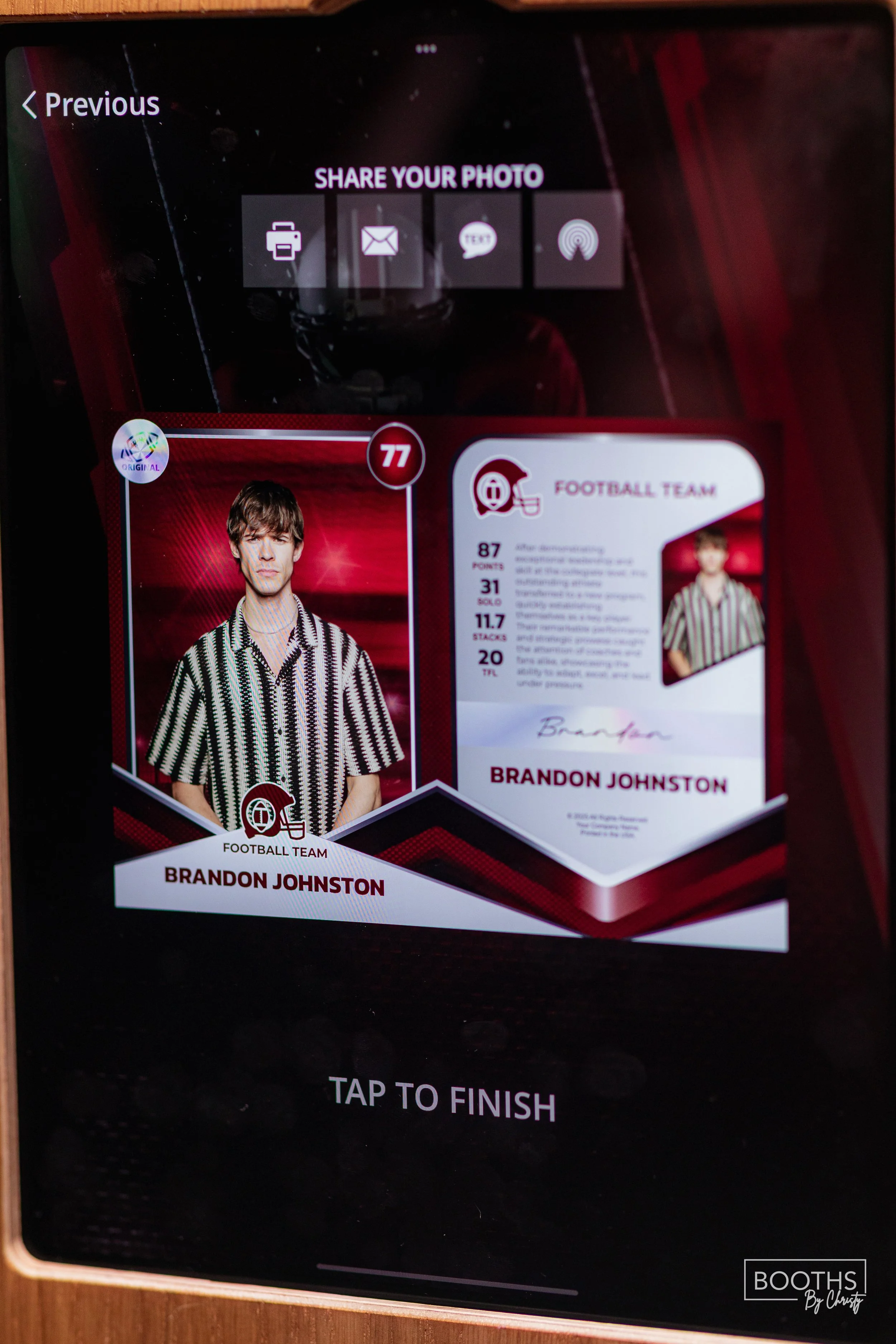 A digital screen displaying a football team card for Brandon Johnston, featuring his photo, stats, and signature, with options to share the photo via print, email, text, and tap-to-finish at the bottom.