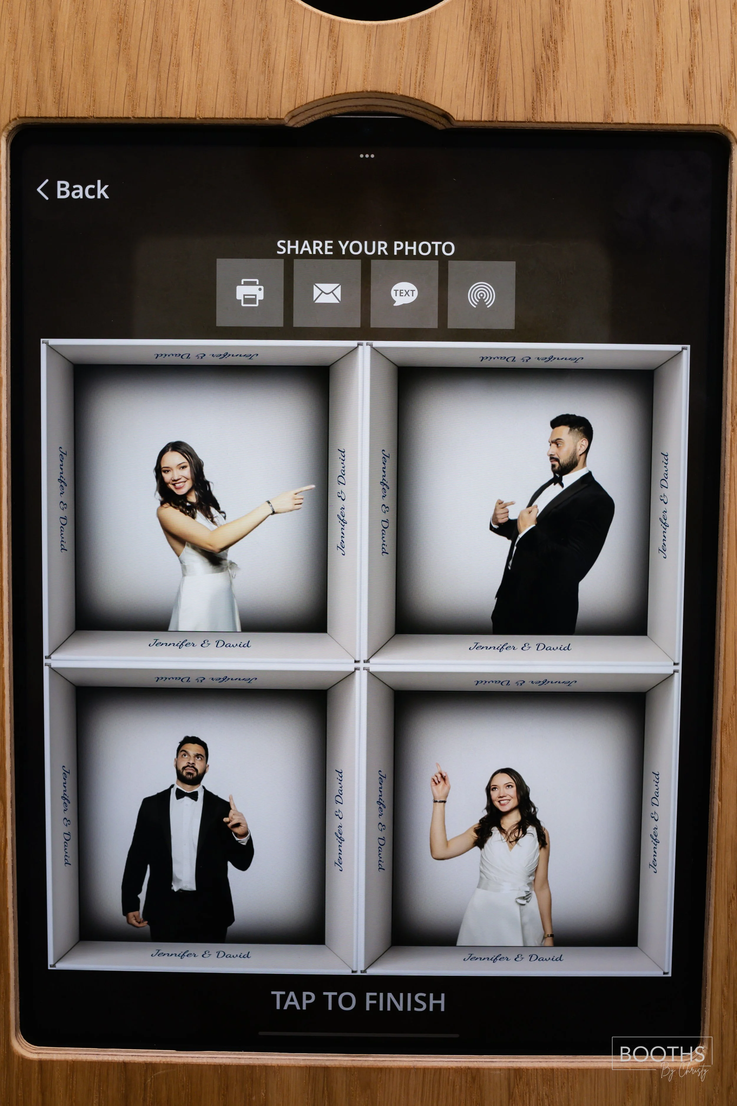A digital photo booth screen displaying four photos of a man and woman in wedding attire. The woman is in a white dress, and the man is in a black tuxedo. The top left photo shows her smiling and pointing to the right, the top right shows him adjusti
