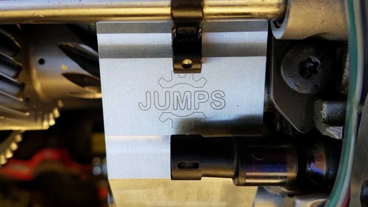 Close up photo of JUMPS distance sensor when installed showing JUMPS logo