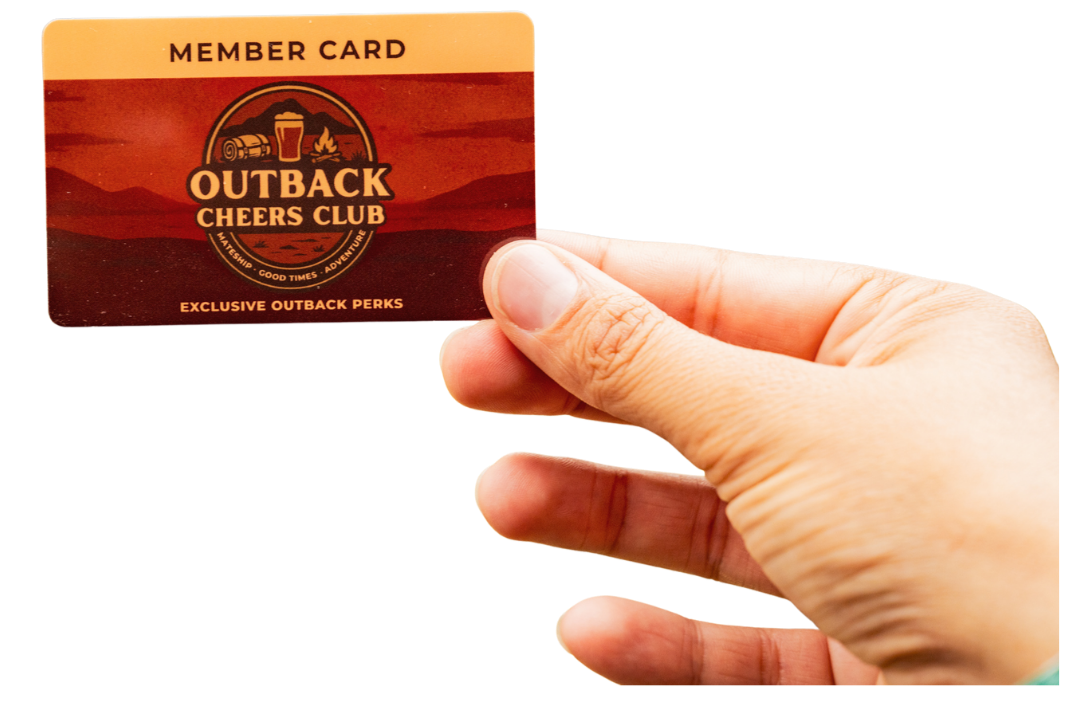 A hand holding an Outback Cheers Club member card against a white background.