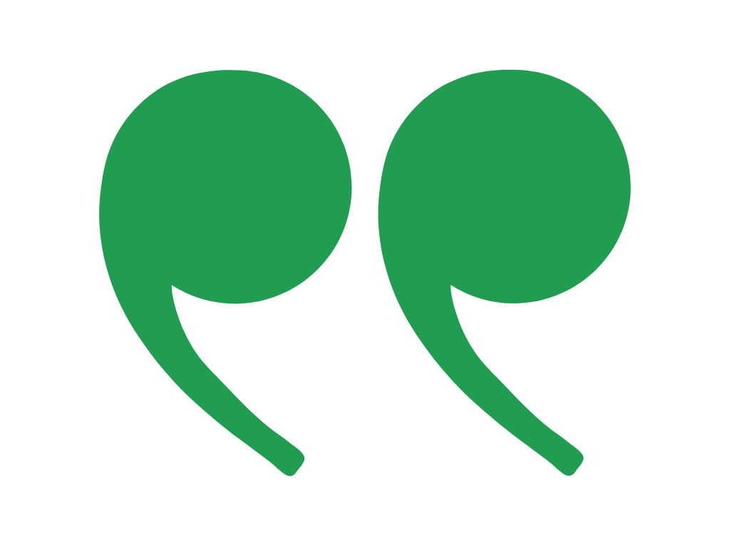 Two green quotation mark icons on a black background.