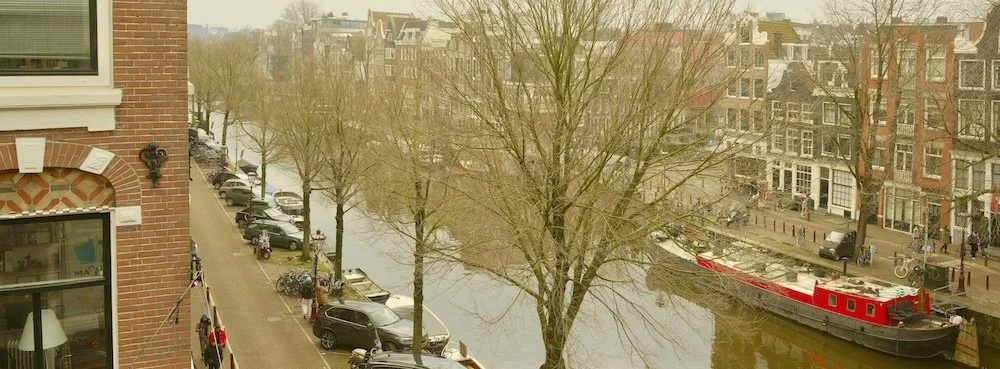 Amsterdam, Prinsengeacht vanuit raam hoek Reestraat