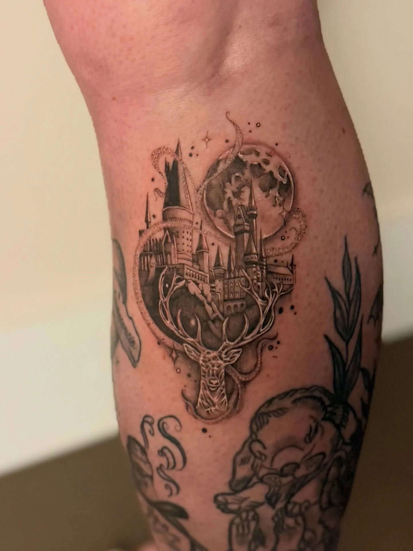 Hogwarts in soft black and grey, built through fine detail and depth, with a Patronus moving gently through it. There is something about keeping it quiet and refined that lets the piece feel timeless on the skin.

I&rsquo;m always drawn to work like 