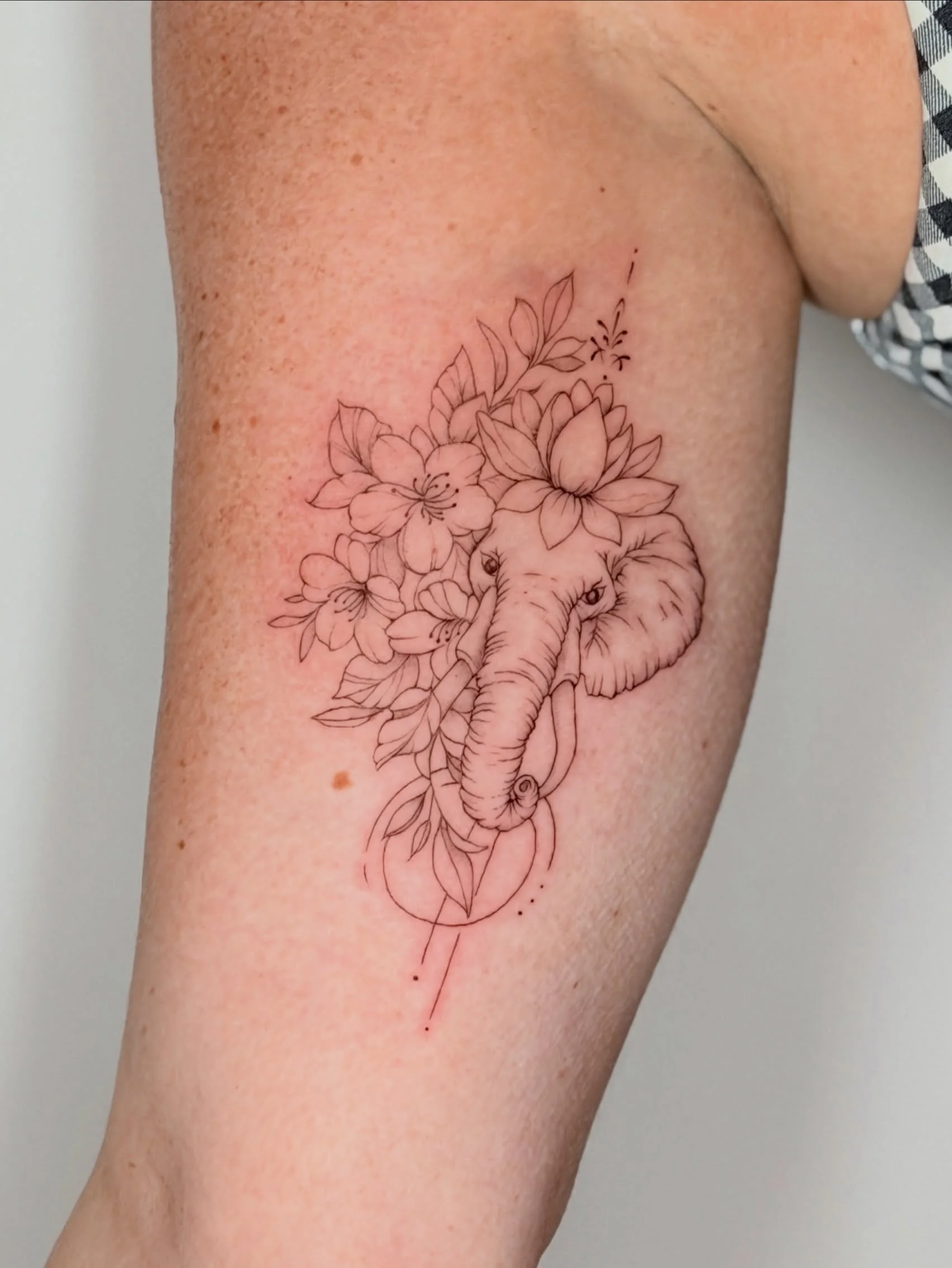 Fine line elephant with botanical detail and geometric elements, black &amp; grey, upper arm.

Custom design, built around what this piece needed to say.

West Palm Beach ✦ Link in bio.

#finelinetattooing #delicatetattoo #southfloridatattoo #westpal