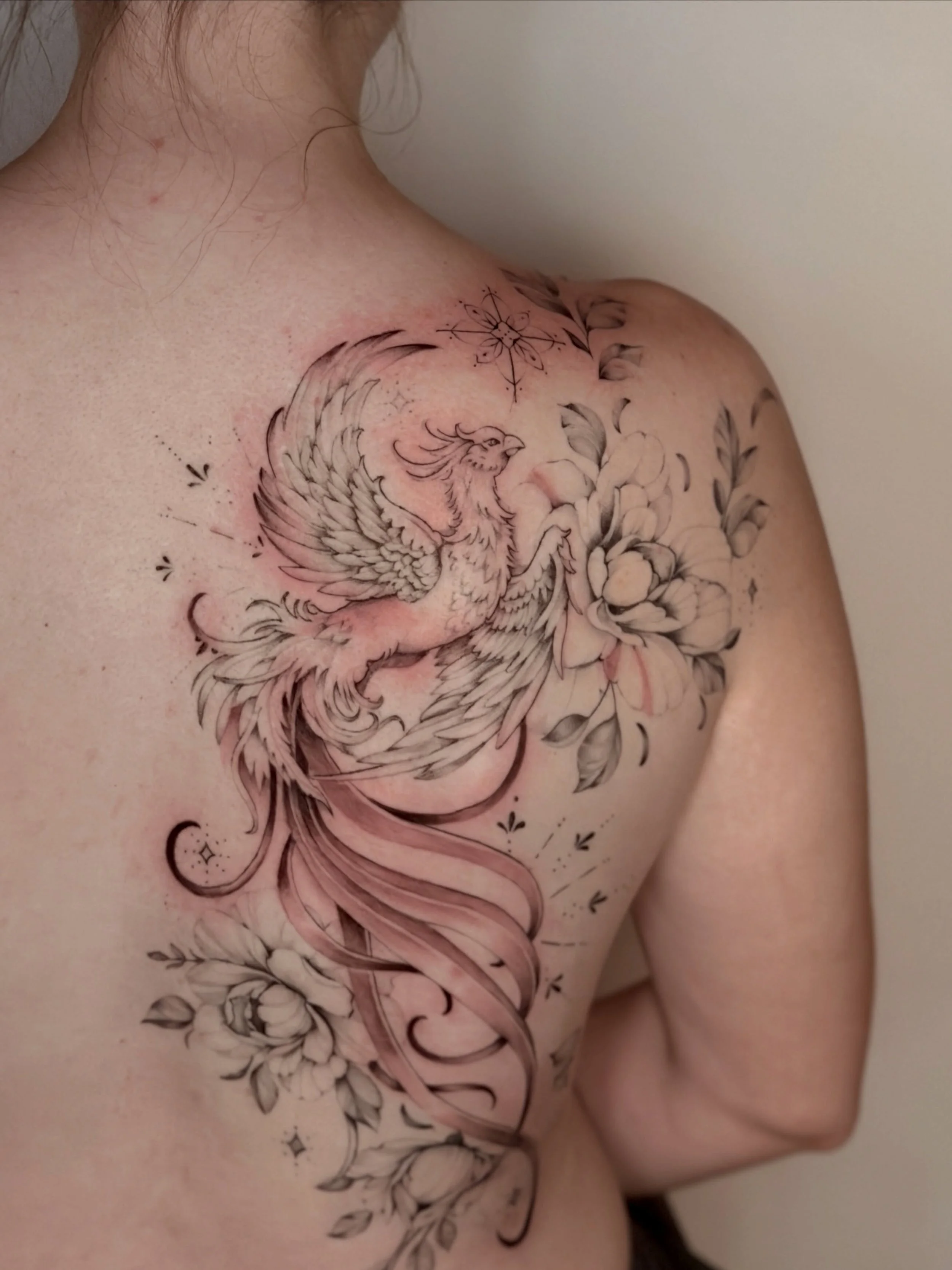 There&rsquo;s a reason the phoenix never gets old.

Rising, rebuilding, becoming. 

Fine line with soft botanicals, and a Phoenix that takes up the whole canvas she gave me. 🤍

Large scale &bull; Fine line &bull; Botanicals &bull; Back Tattoo

West 