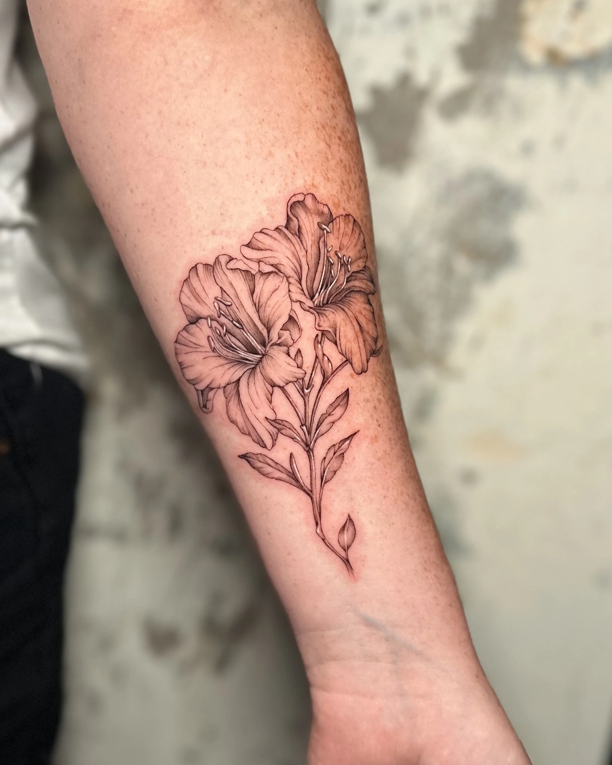 west-palm-beach-fine-line-black-and-grey-flower-tattoo.jpg