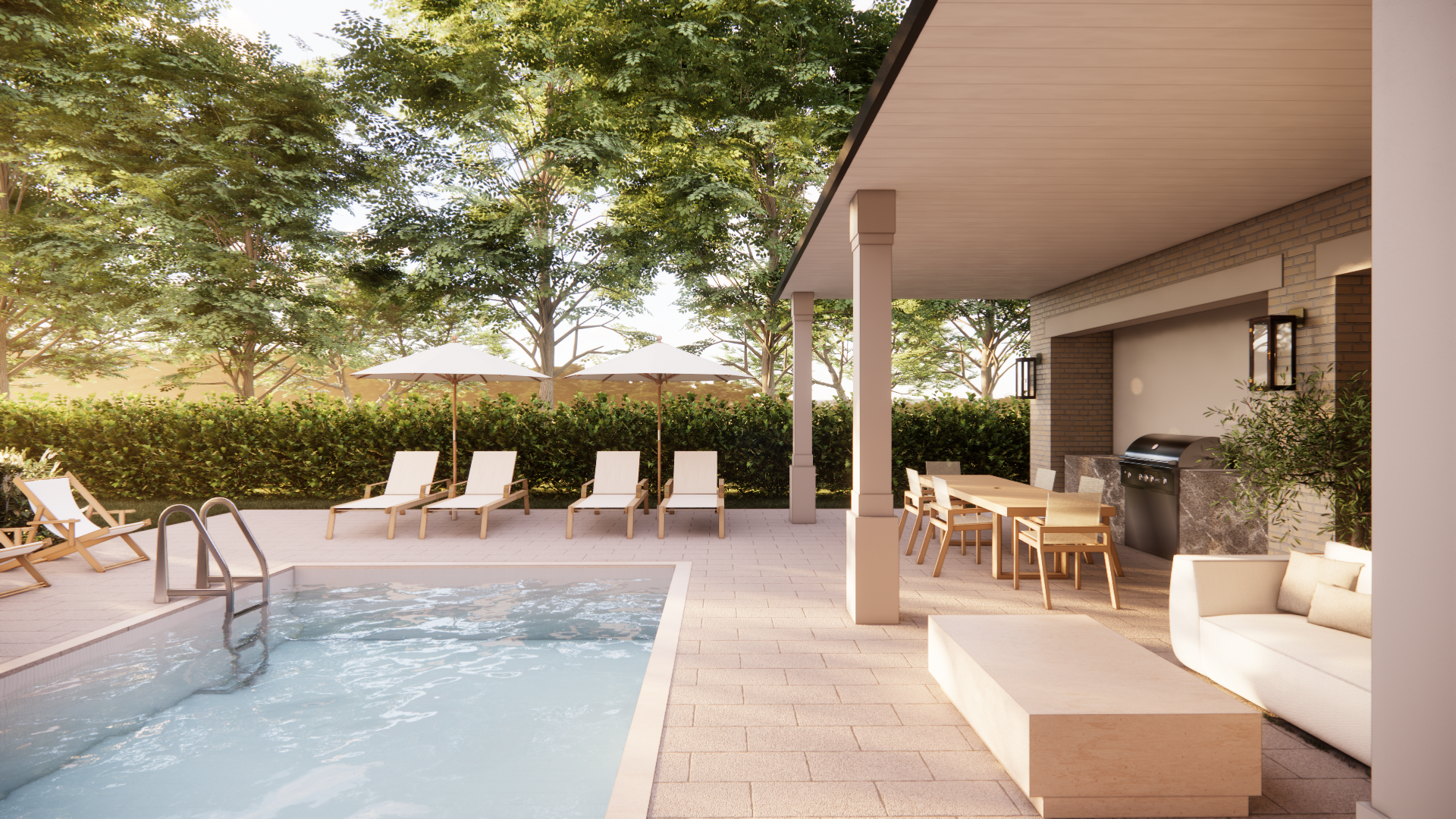A backyard pool area with lounge chairs, umbrellas, a dining table with chairs, a barbecue grill, and lush trees in the background.