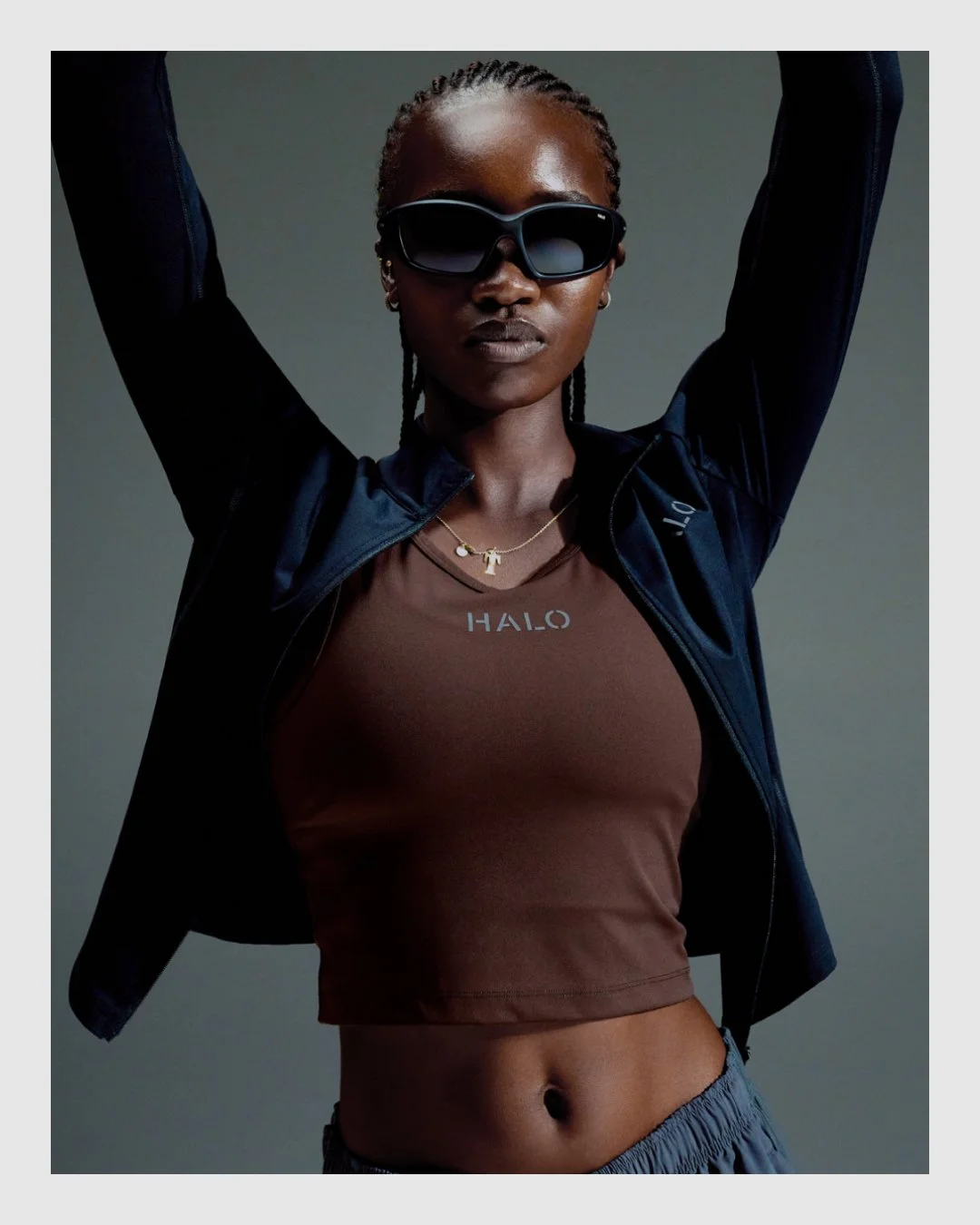 HALO fashion campaign portrait with sunglasses and technical sportswear