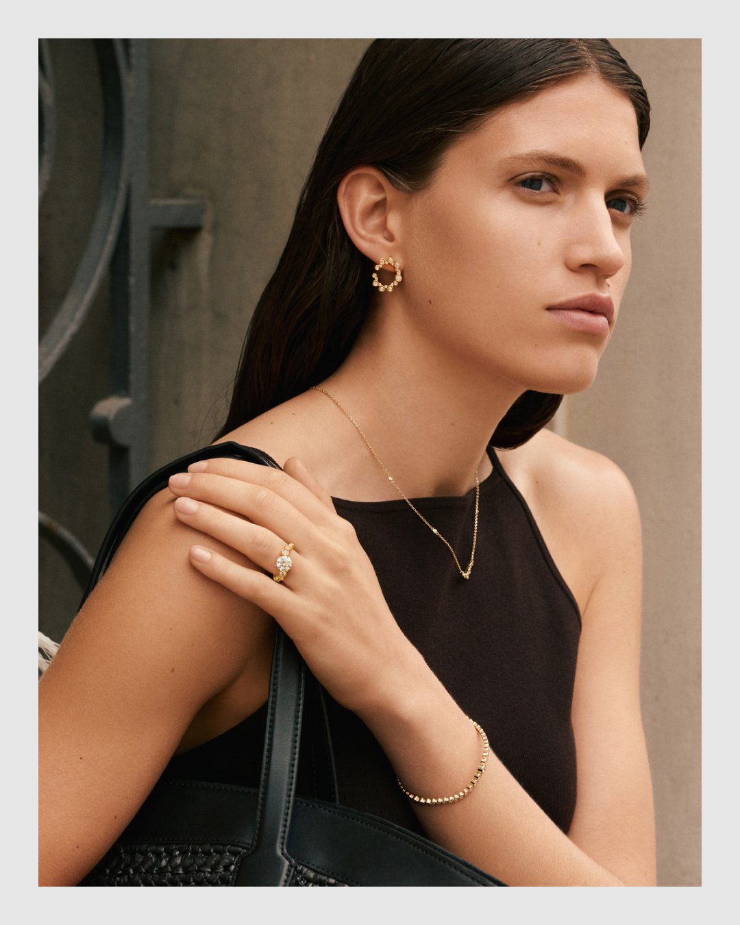 Portrait of model wearing Cherituelle diamond earrings, necklace, ring and bracelet – fine jewelry campaign retouching by Le Lemon
