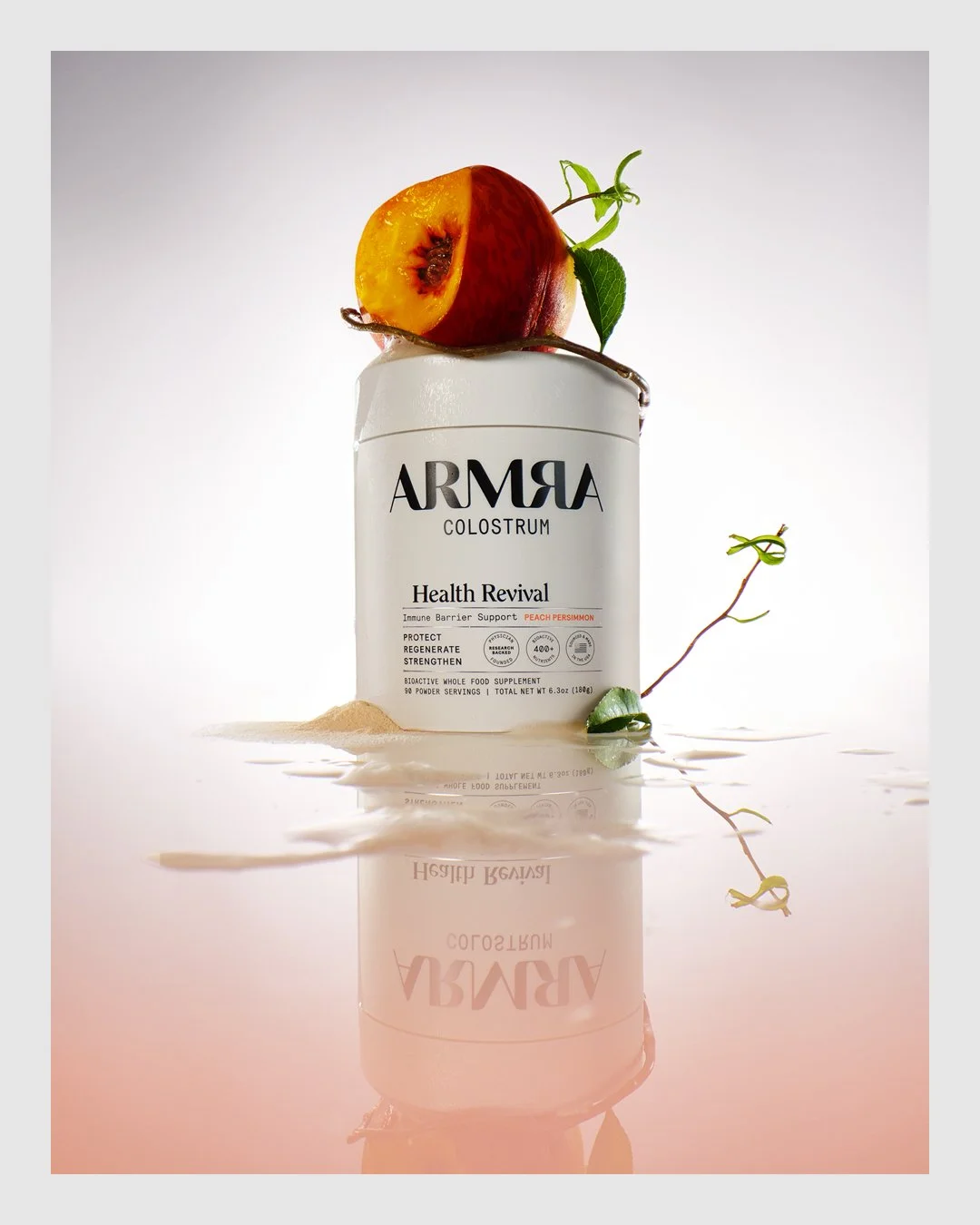 ARMRA Health Revival product styled with peach and botanical details