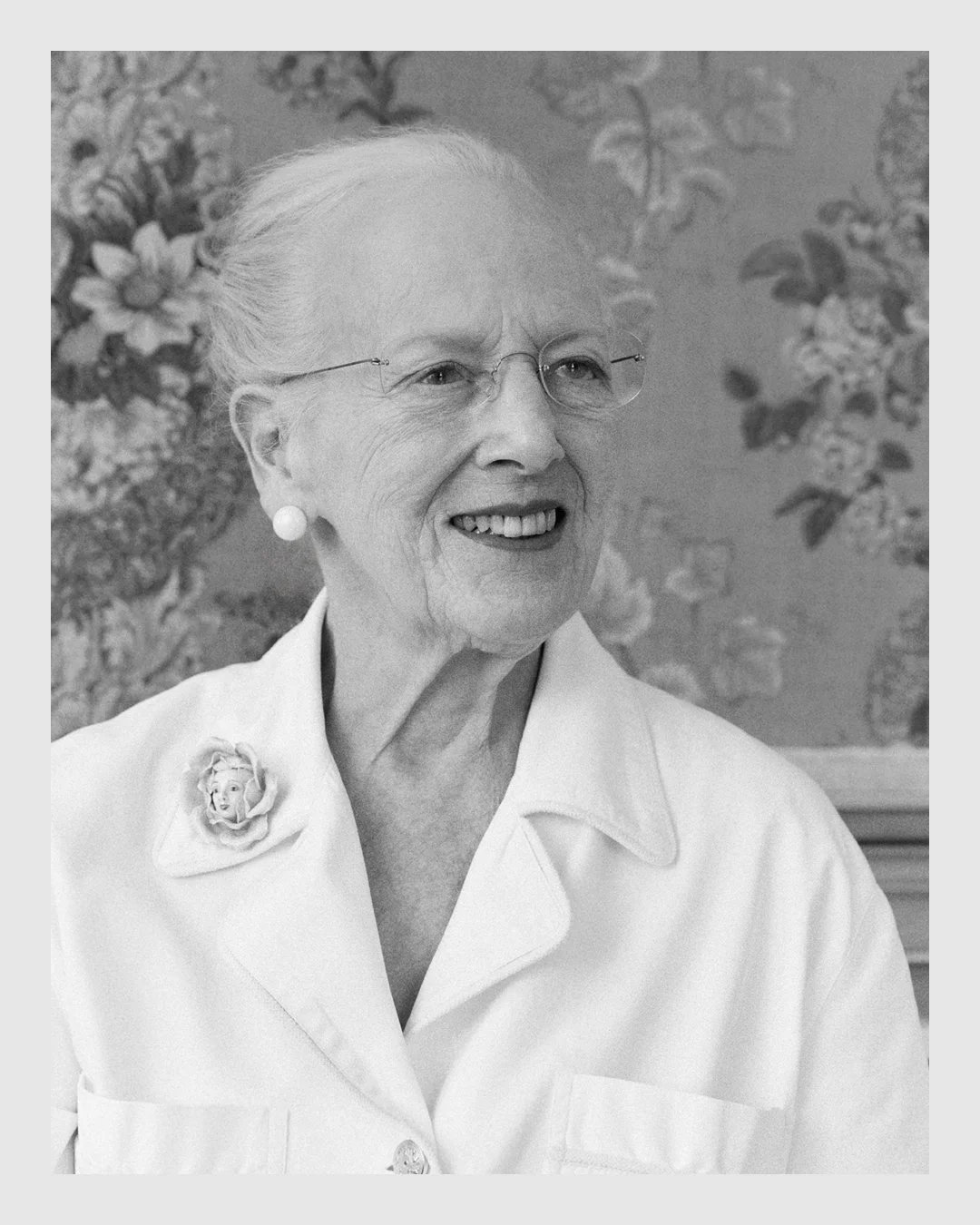 Black and white portrait of Queen Margrethe II smiling