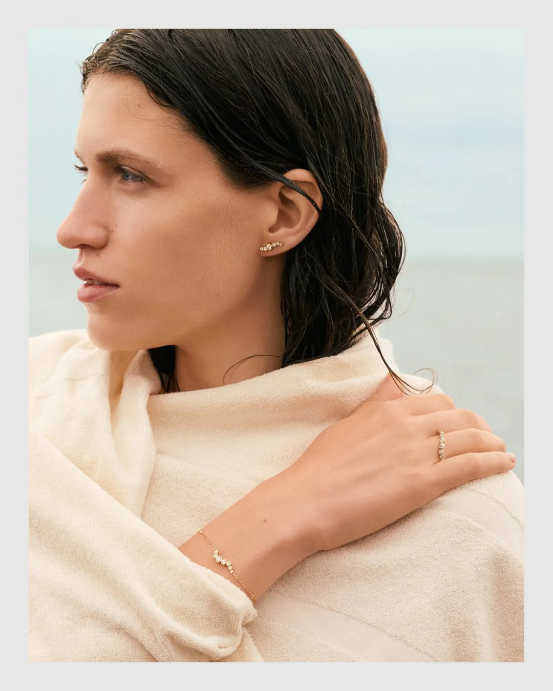 Beauty portrait featuring Cherituelle diamond earrings, ring and bracelet – jewelry and skin retouching by Le Lemon