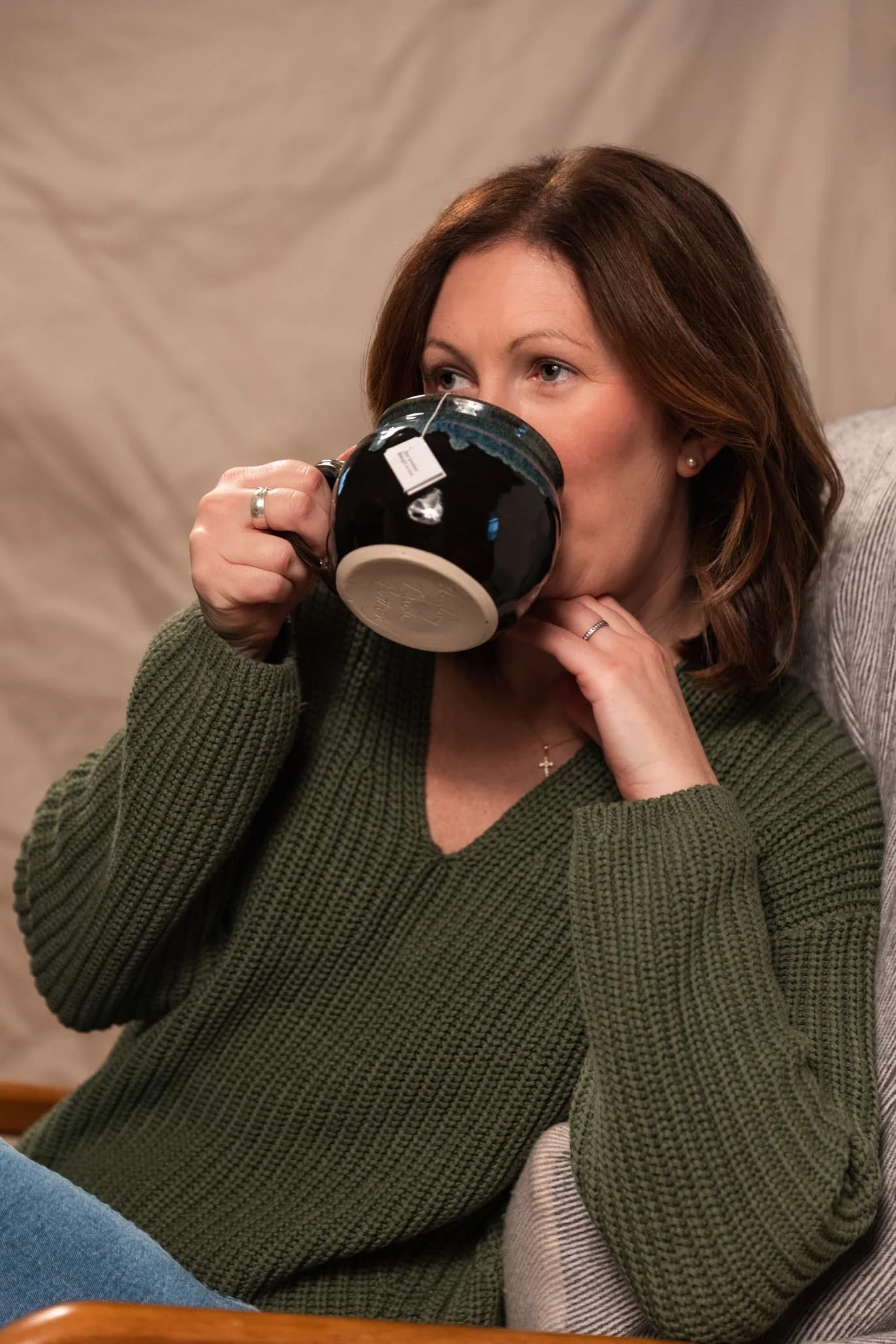 Women's health therapist Chelsy Catsam sips a mug of tea in York, PA.