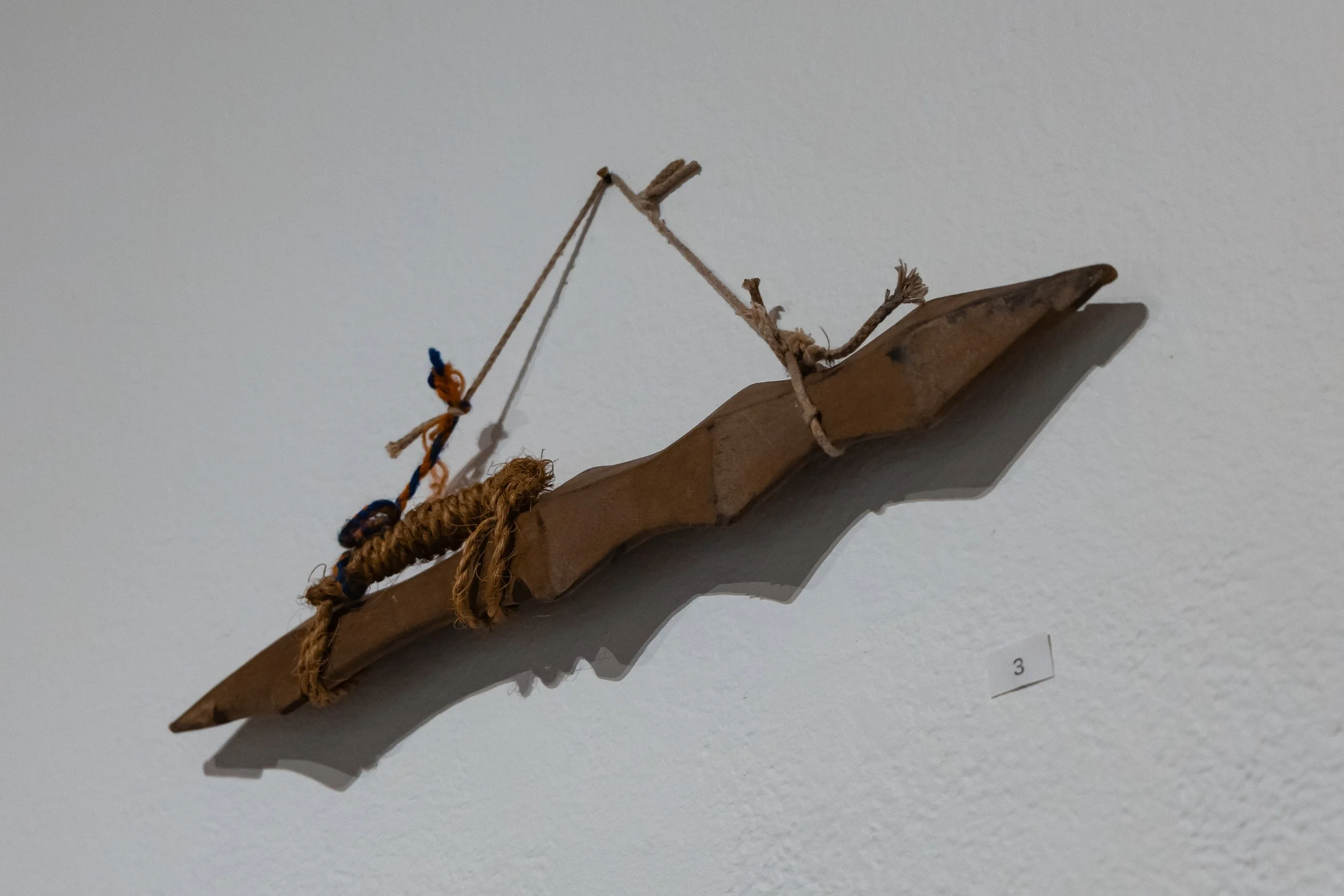 Basketry and War Club: Joe Panglinan’s carved hardwood war club replica is usually longer and secured around the wrist with the rope.