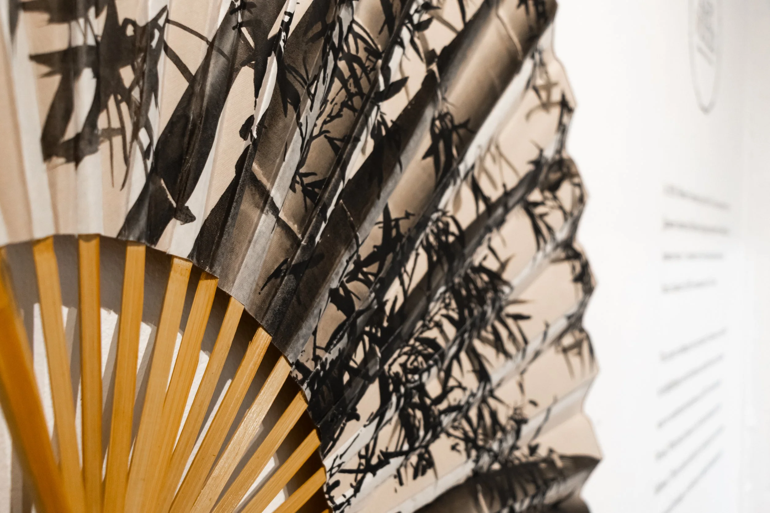 Fan: Simon Huang's decorative bamboo fan represents the tradition of Chinese fans used in dance, theater and religious ceremonies.