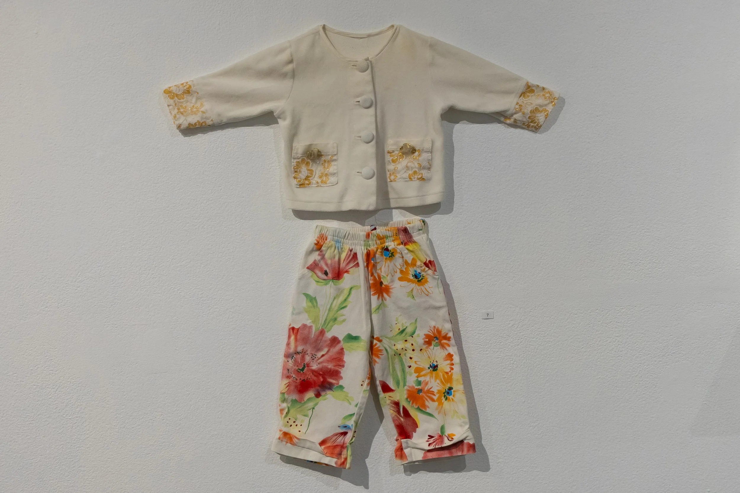 Baby shirt and pants: Lauren Walther wore this outfit as a 10-month-old in China when she was first handed to her adoptive parents.