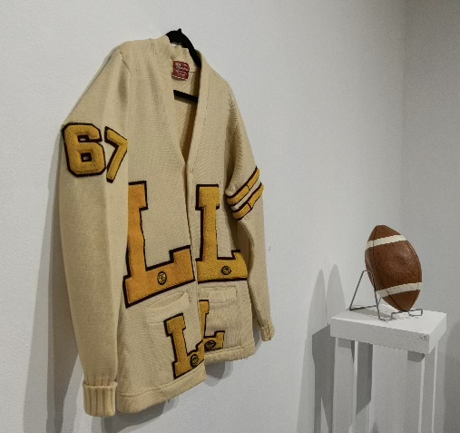 Letter Sweater: The only Asian at Lutheran North High School, Ed Shew "fit in" as an athlete and he proudly wore his letter sweater.