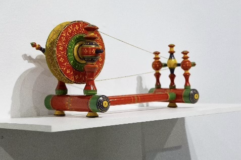 Charkha: Dr. Ghazala Hayat shows Pakistan's rich textile tradition with this decorative replica of a traditional spinning wheel.