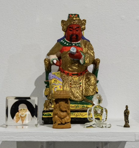 #24 Laughing Buddha: A housewarming gift to Simon Huang from his mom, this Buddha symbolizes joy and prosperity.