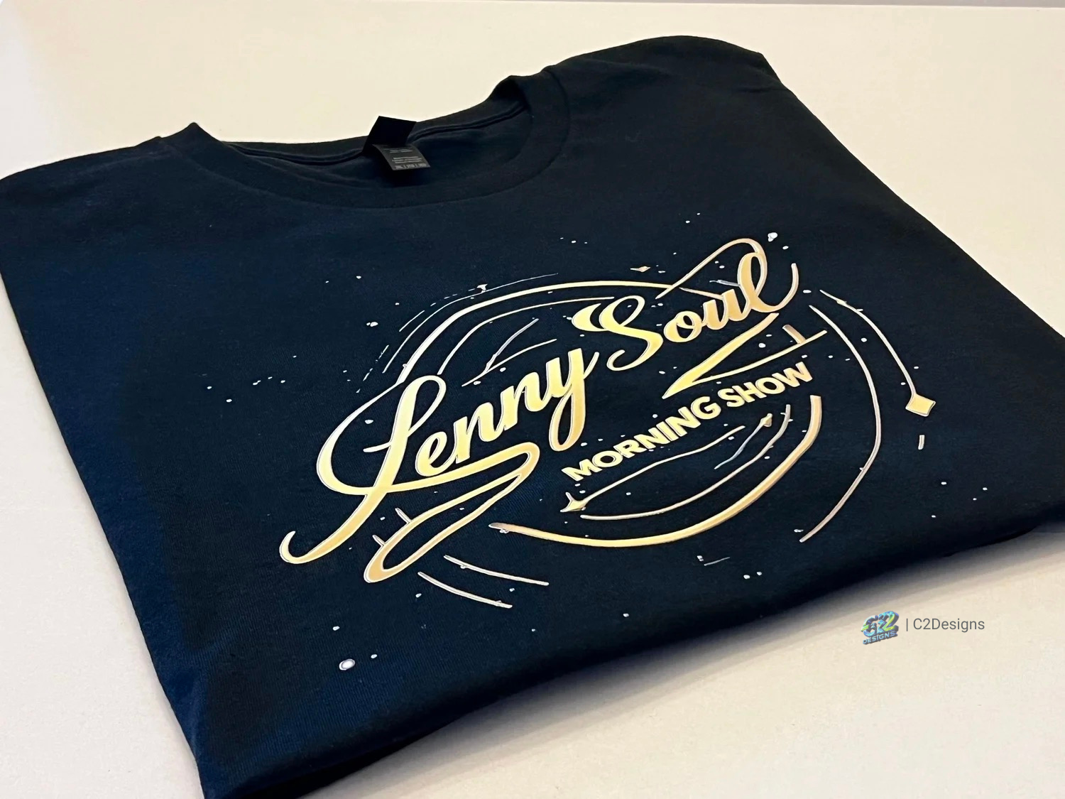 Black T-shirt with a cream-colored design and text that reads "Lenny Soul Morning Show".