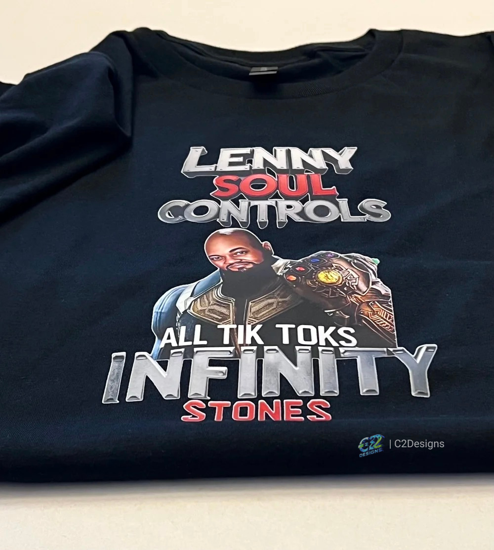 Black T-shirt with custom graphic design featuring a man in a costume resembling Thanos from Marvel, with text referencing Lenny, Soul, Tik Toks, Infinity Stones, and C2Designs.
