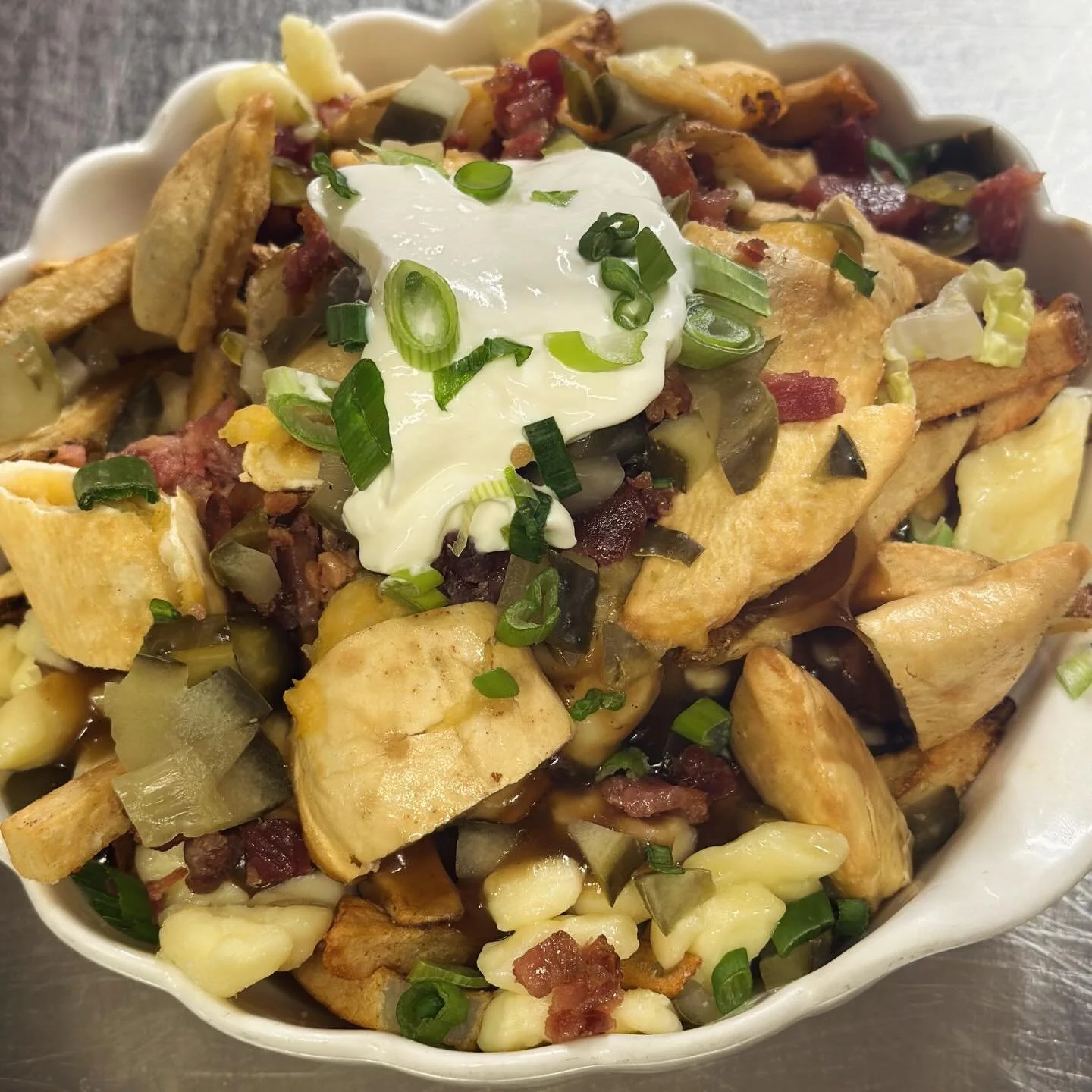 We&rsquo;re about to make your Monday a lot more special&hellip; 
By fan request, behold today&rsquo;s feature-
The Perogie Works Poutine
Fresh cut fries, cheese curds, gravy, bacon, diced dill pickle, chopped perogies, sour cream &amp; green onion! 