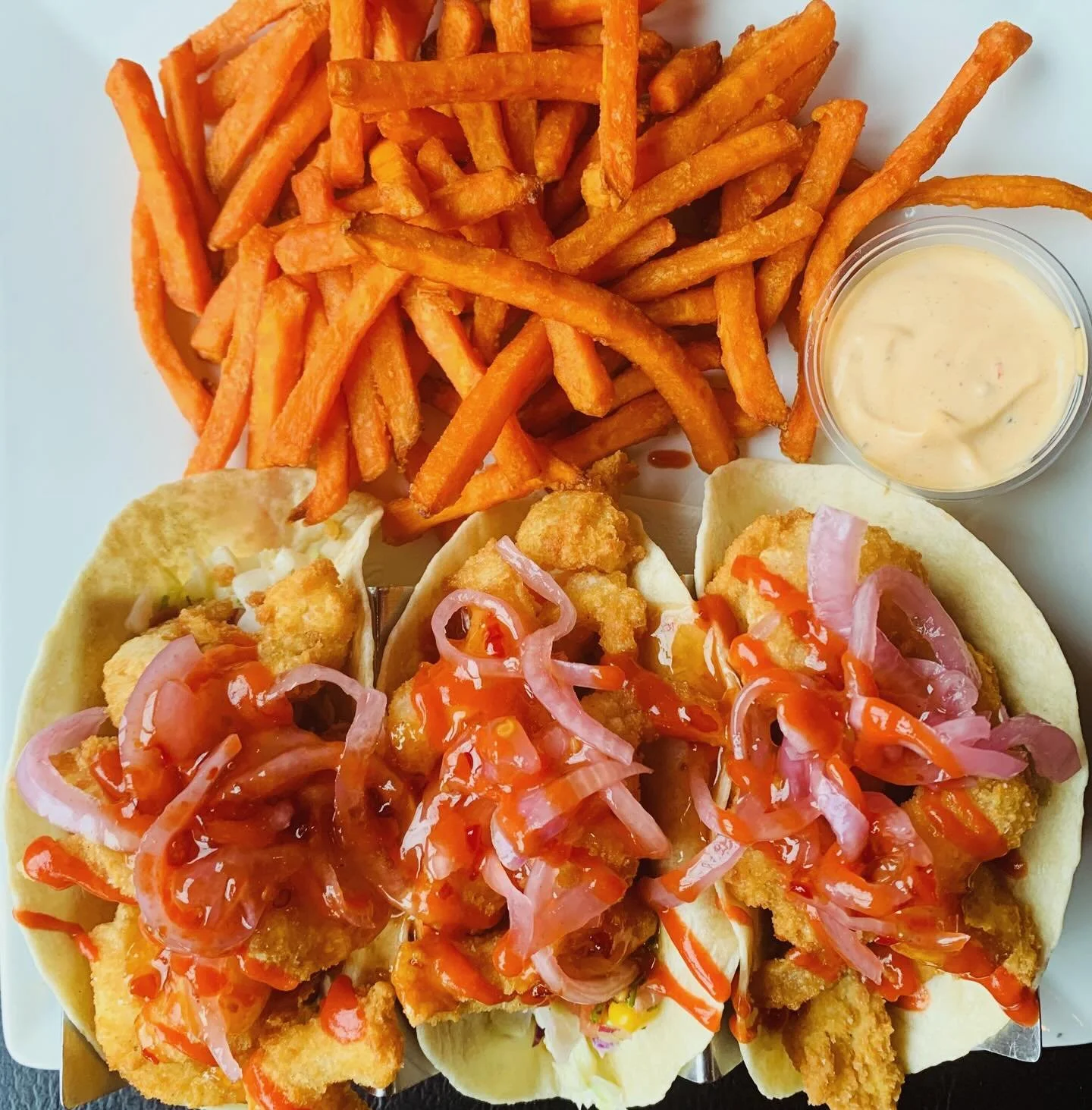 It may be gloomy and gray outside but it&rsquo;s always bright and shiny in here! 
Today&rsquo;s chef creation is a prime example of just that..

Bang Bang Shrimp Tacos
Crispy fried shrimp, coleslaw, roasted corn pico de gallo, sriracha- sweet chili 