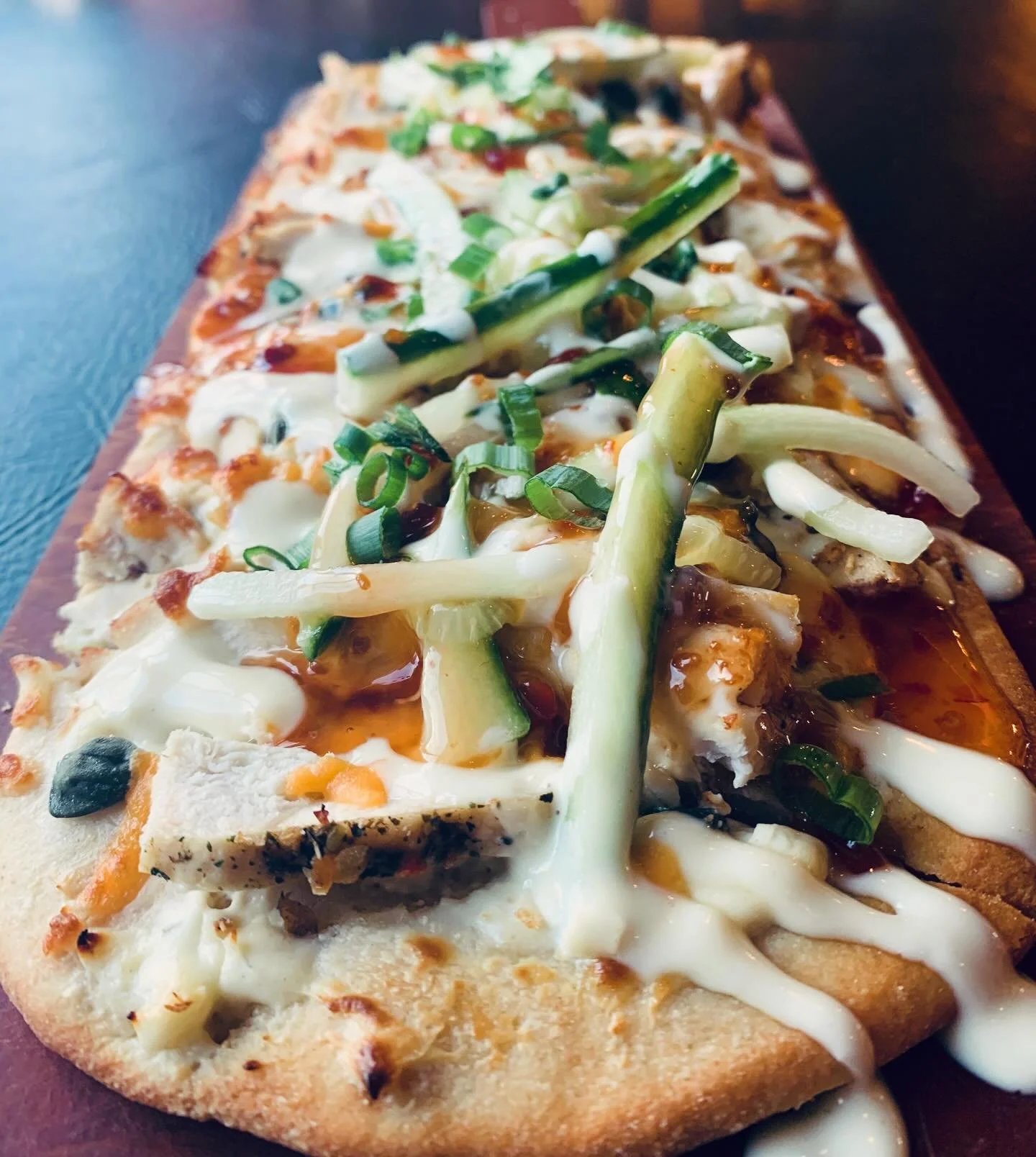 Sunny Sunday calls for riverside dining adventures, on the Baird today&hellip;.
The Capered Chicken Flatbread
Roasted chicken breast, capers, herbed cream cheese, crisp, julienne cucumber, sweet chili sauce, mixed shredded cheese &amp; garlic aioli! 
