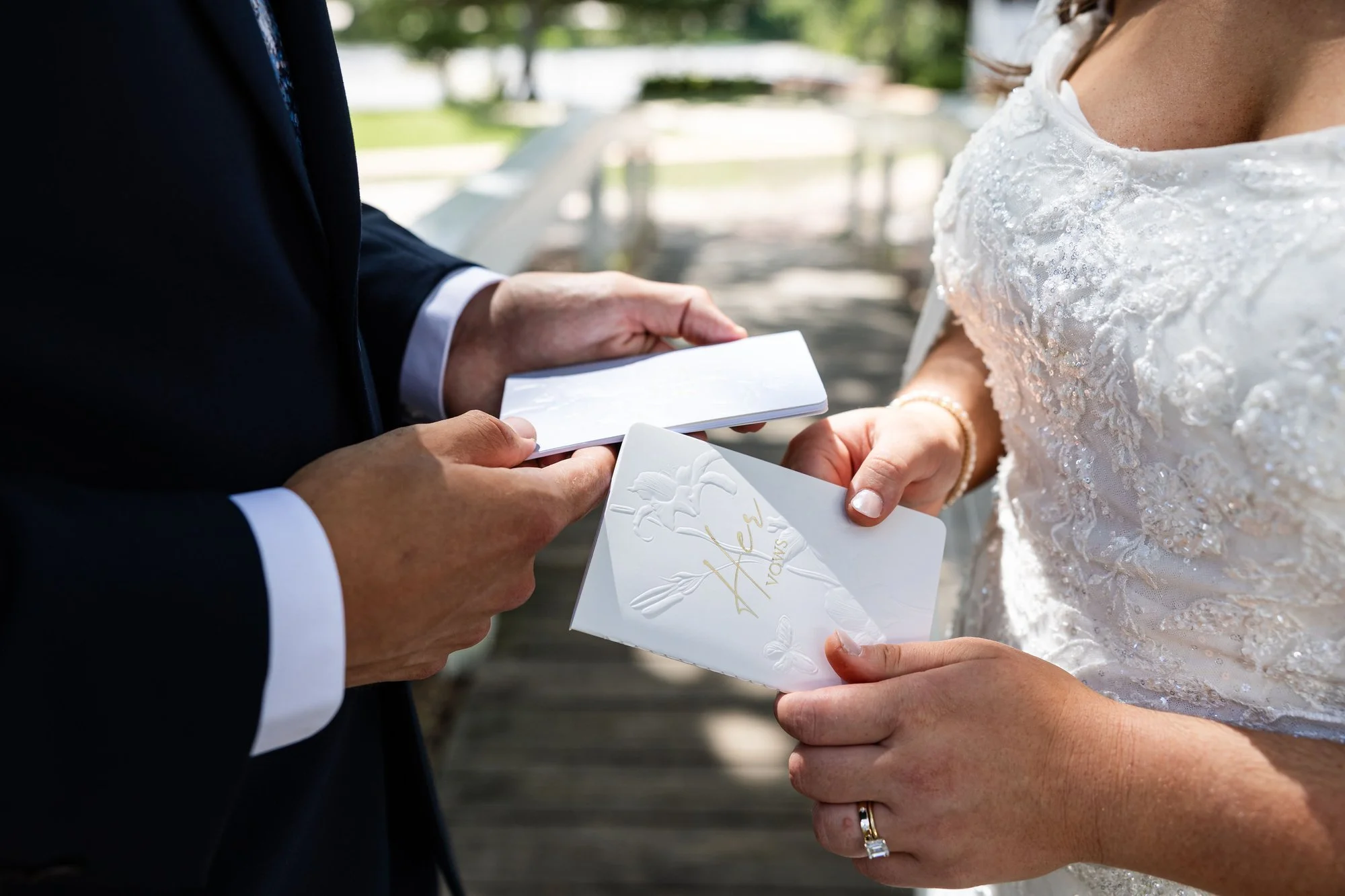 bride-and-groom-exchange-handwritten-letters-standing-in-wed.jpg