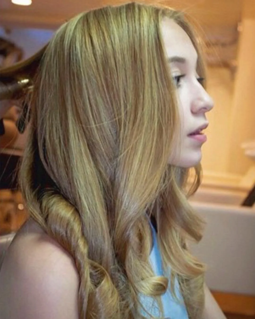 Professional blonde balayage and dimensional hair color by Grace Gutierrez at Inwood Hair Studio in New York City
