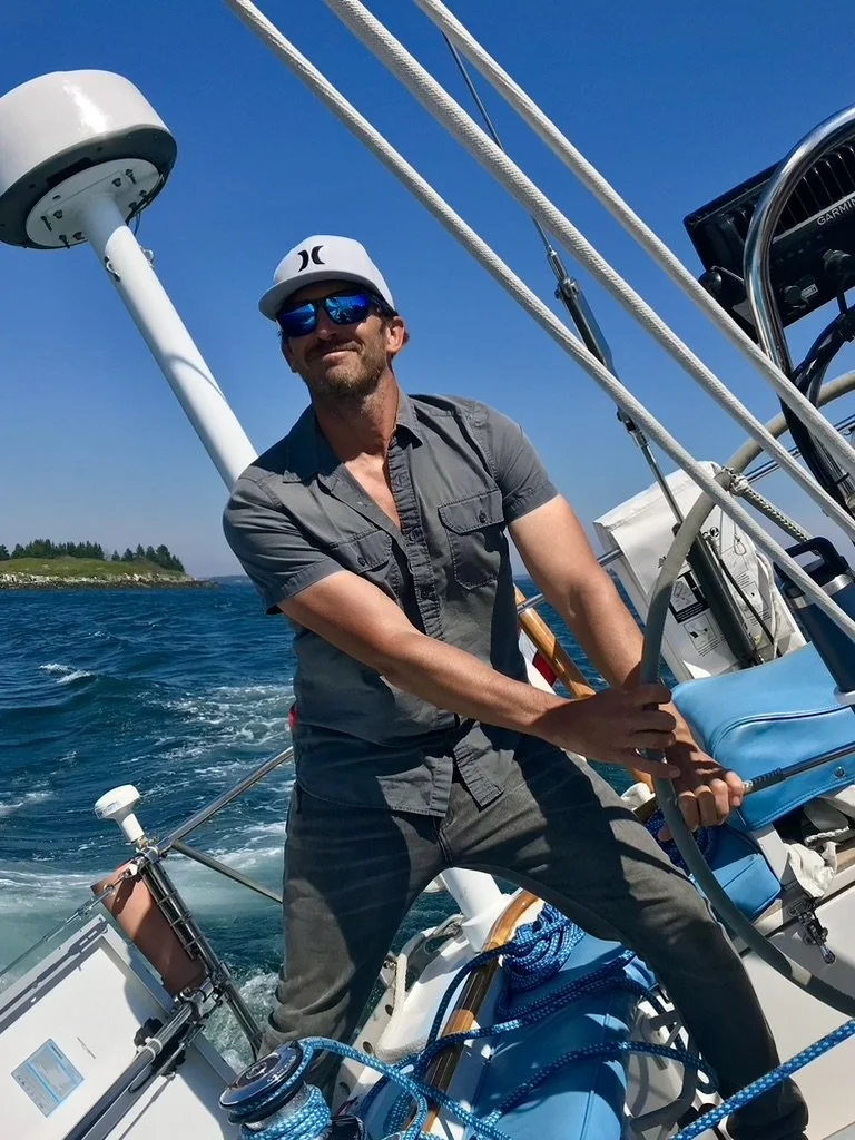 laird kopp sailing a racing sloop