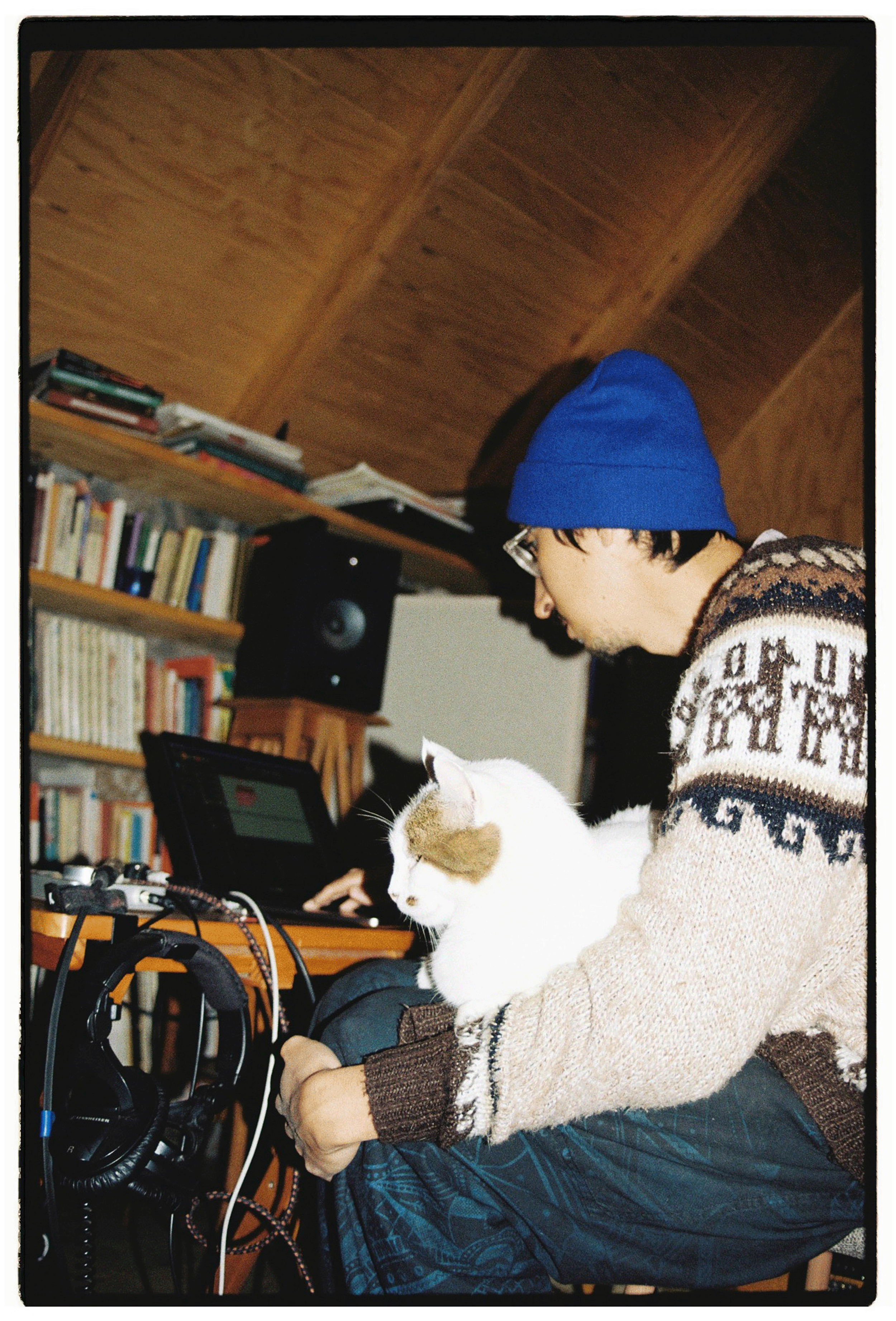 Dr. Saiz and Gatini the super cat working on music at the studio in Aculeo Lake