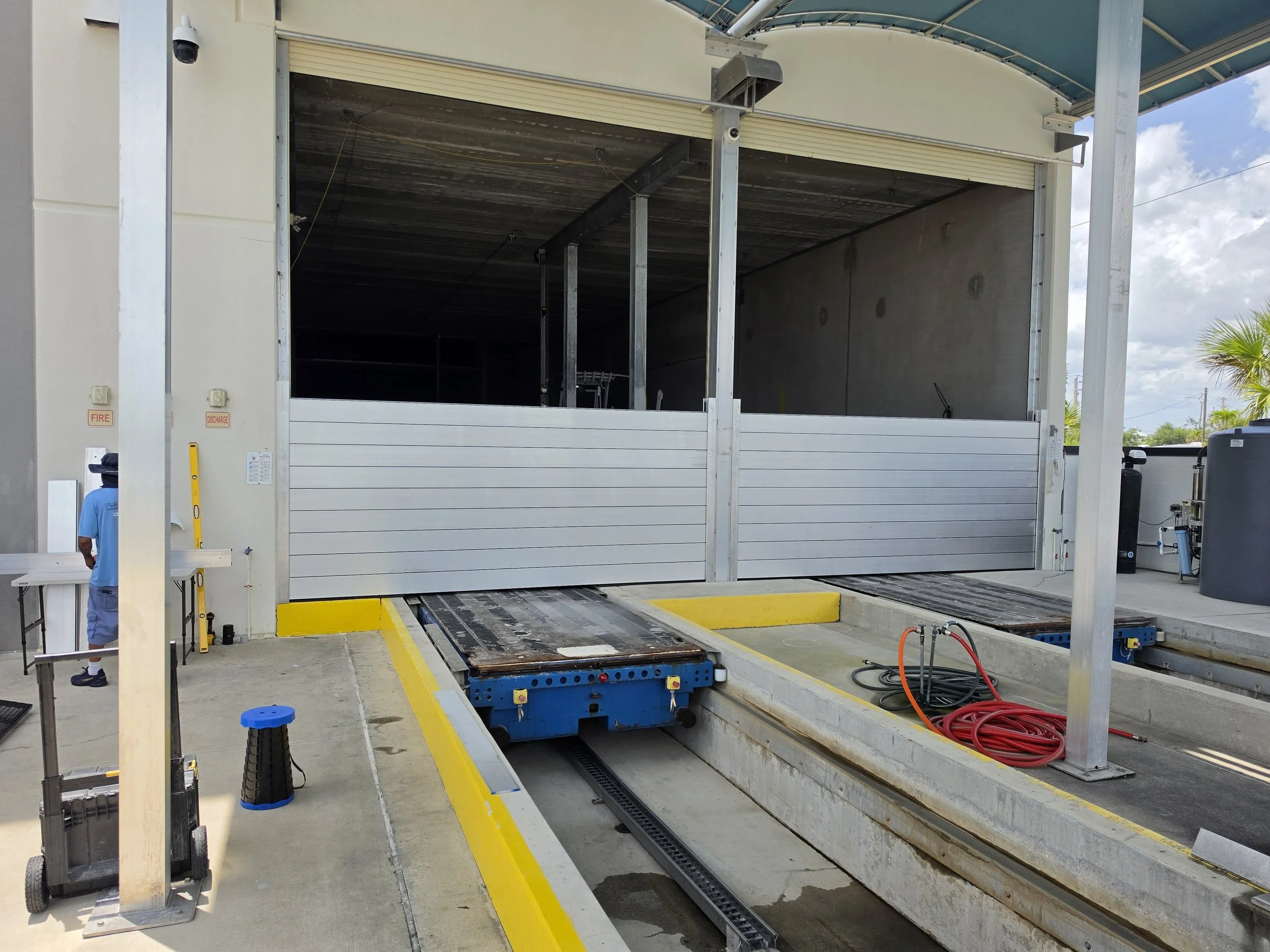 Commercial Aluminum Flood barrier with a custom fabricated track underneath