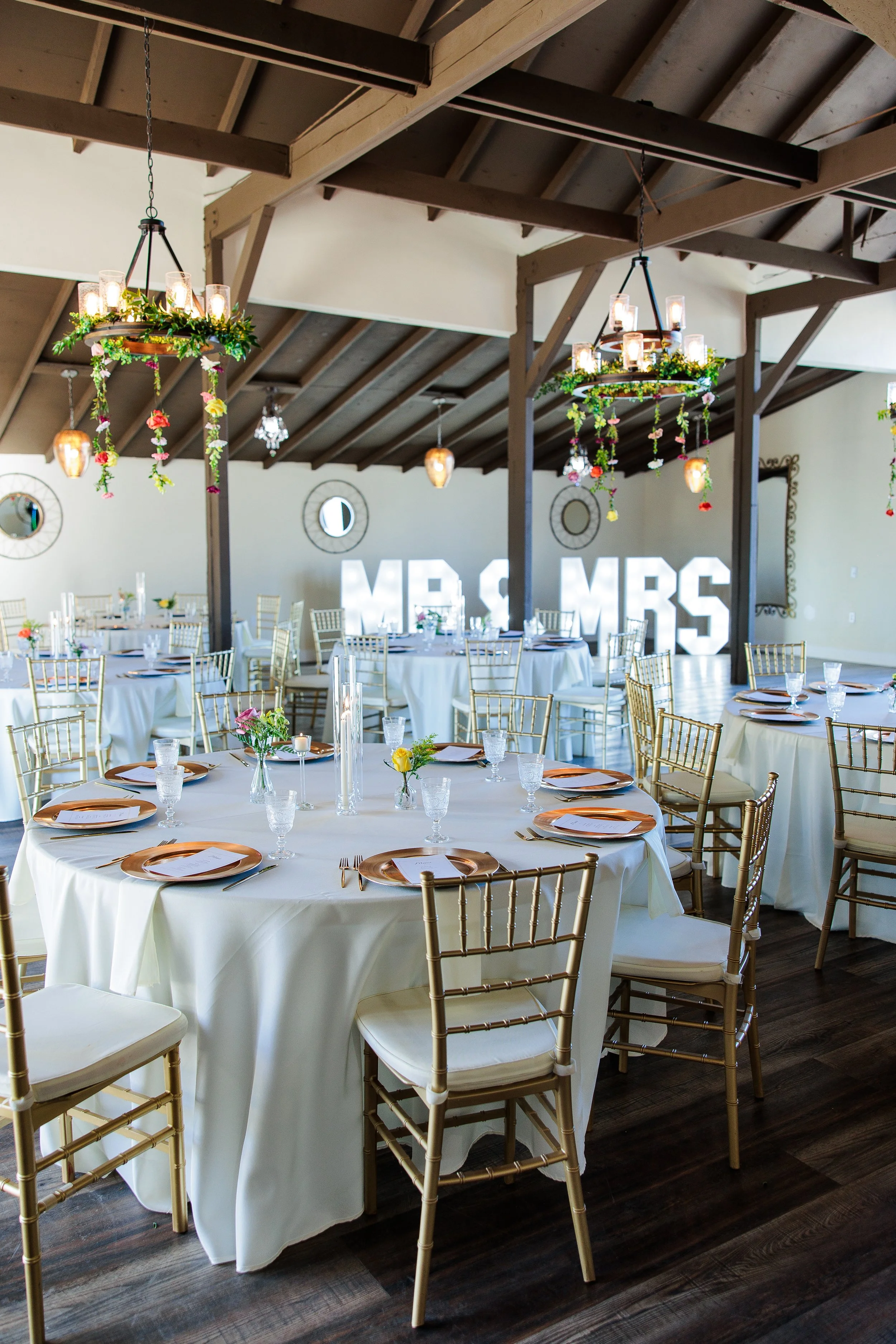 Beautiful wedding reception area with light up marquees in the back