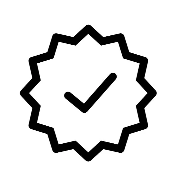 Black star-shaped badge with a check mark inside