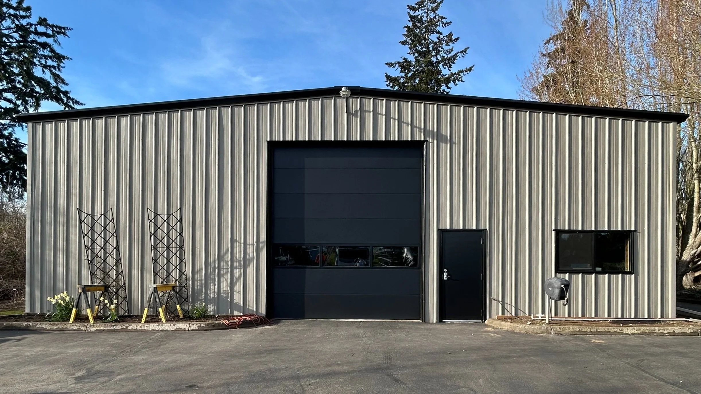 Commercial building exterior freshly painted by H&B Painting Co in modern neutral tones