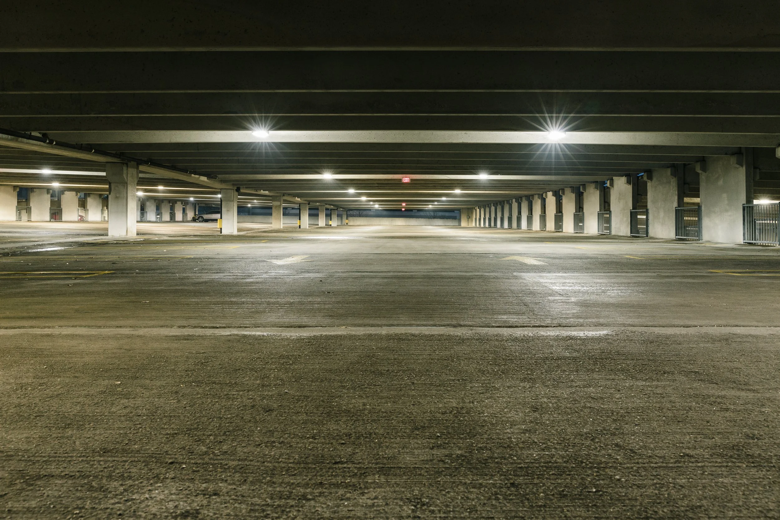 Poorly lit parking lot at night, the kind of condition at issue in a negligent security claim.